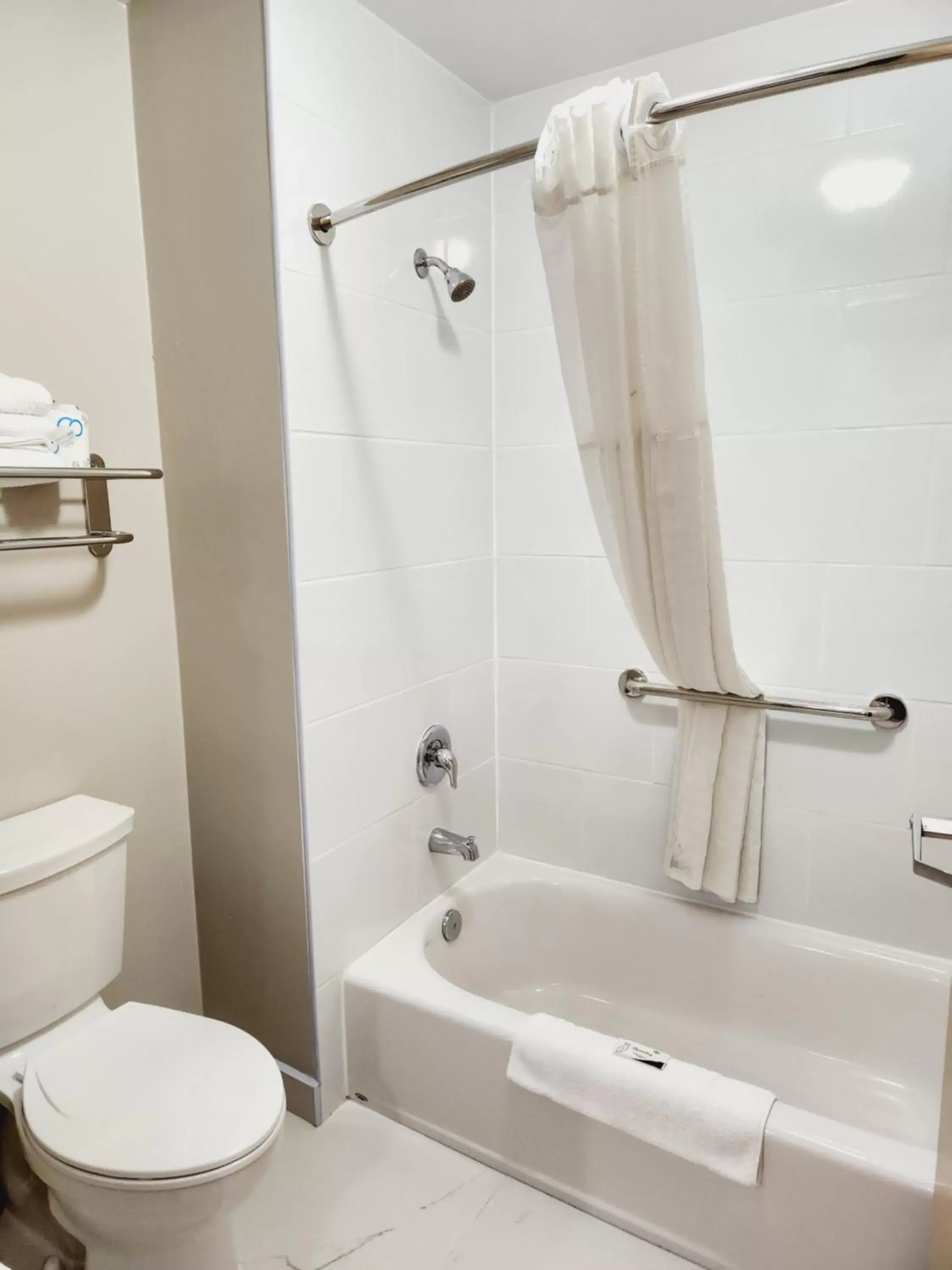 Bathroom in Days Inn & Suites by Wyndham Corpus Christi Central