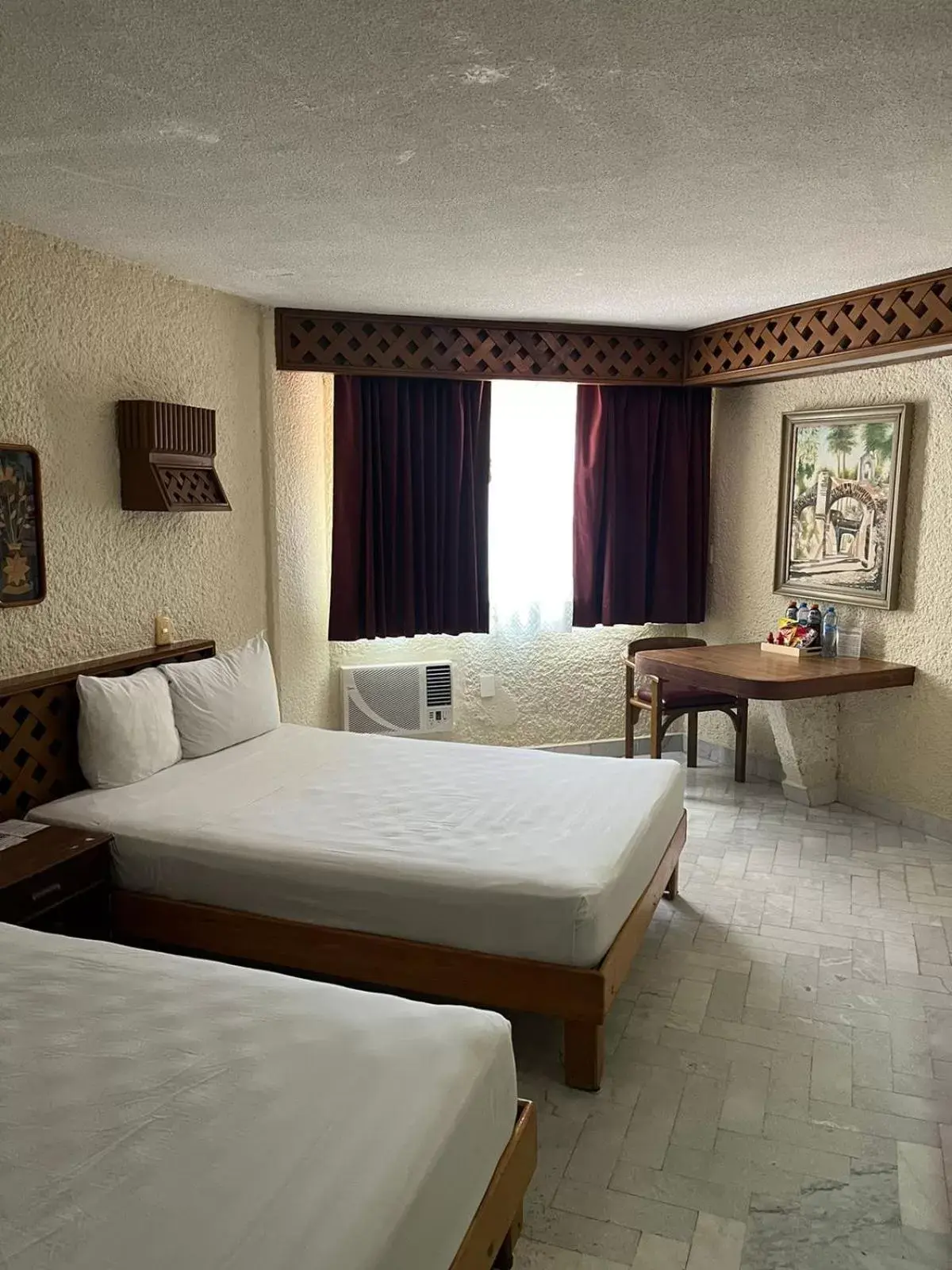 Bed in Hotel Plaza Kokai Cancún