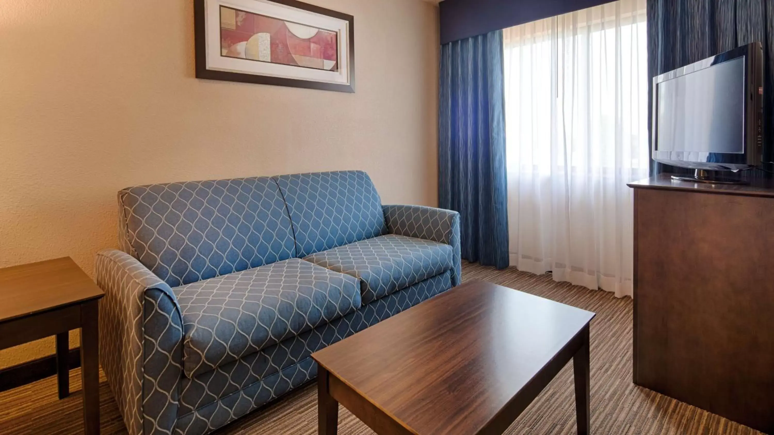 Photo of the whole room, Seating Area in Best Western Port Huron Blue Water Bridge