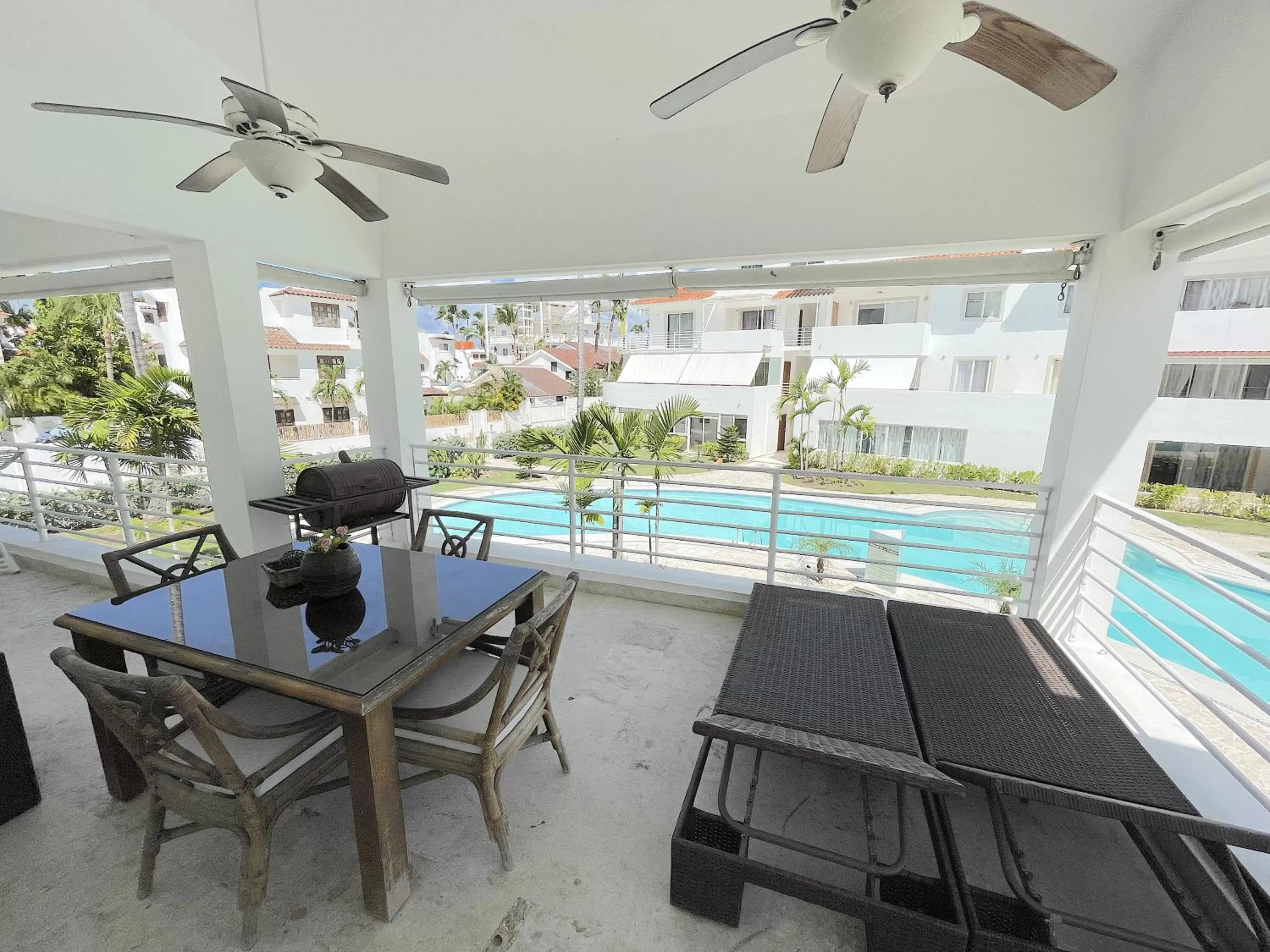 Patio, Pool View in BEACH Condo-HOTEL with VILLAS & PRIVATE Apartments WIFI BBQ Beach CLUB & SPA