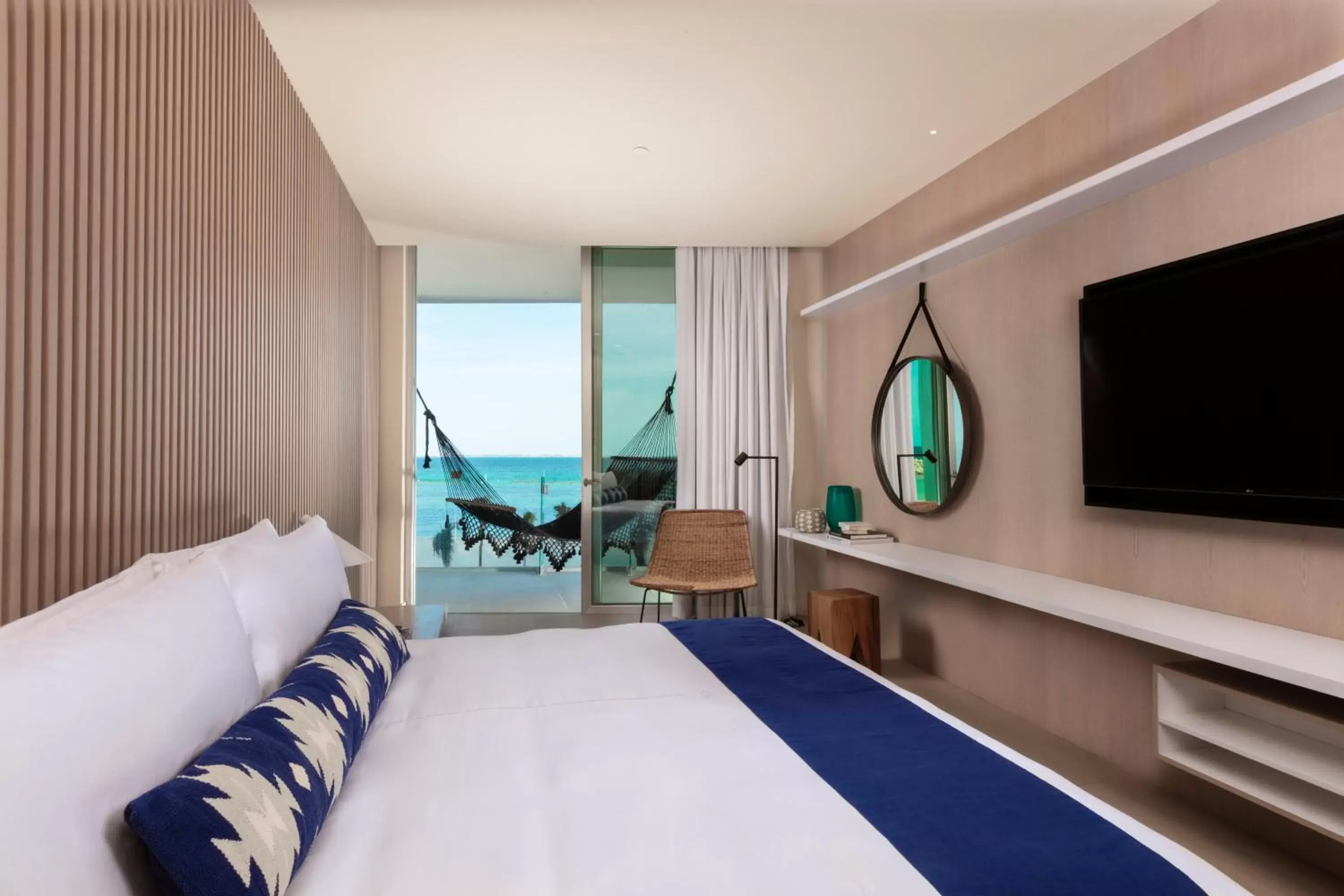 Bedroom, TV/Entertainment Center in SLS Cancun Hotel & Spa