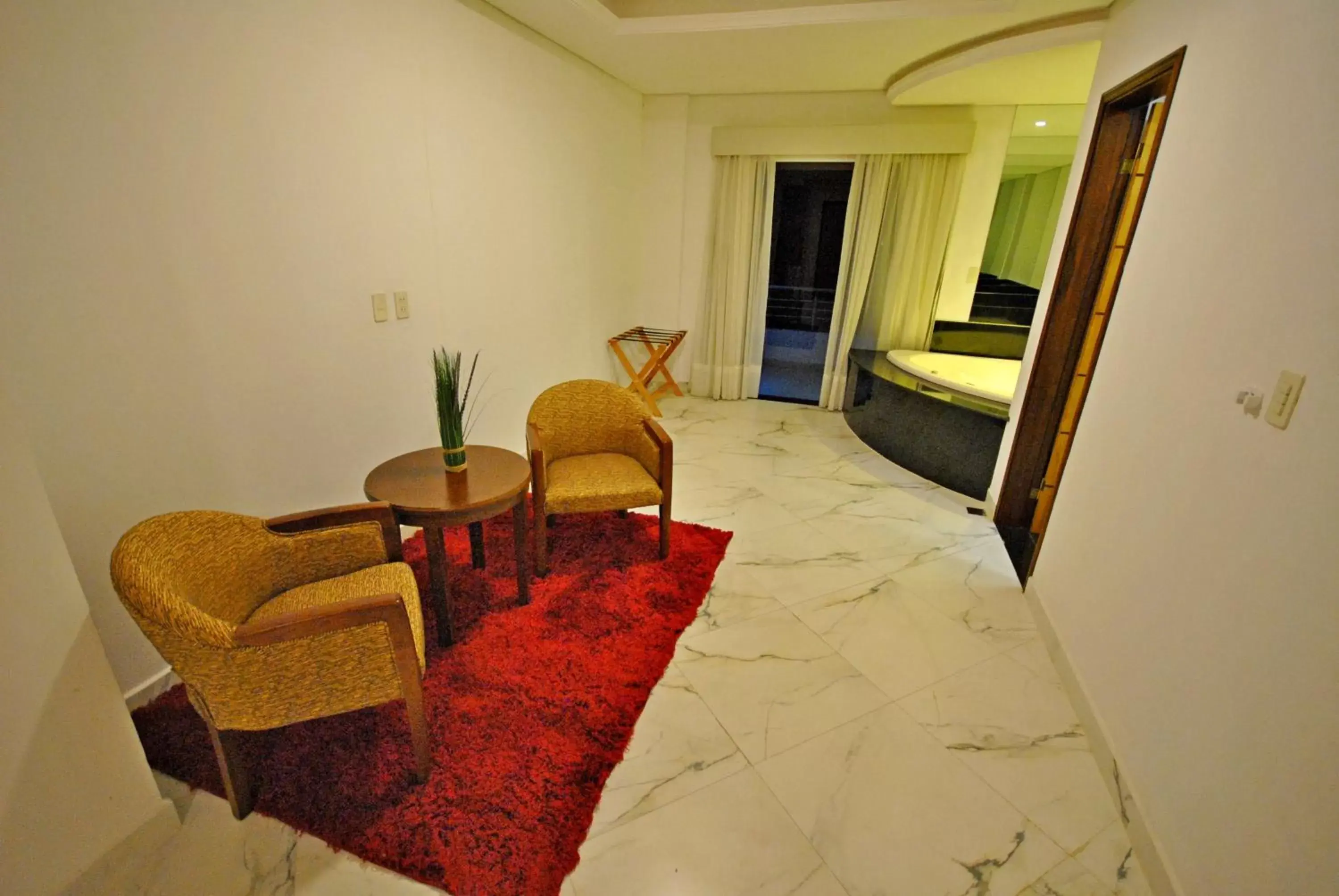 Seating area, Bed in Los Lagos Resort Hotel Seating area, Bed in Los Lagos Resort Hotel