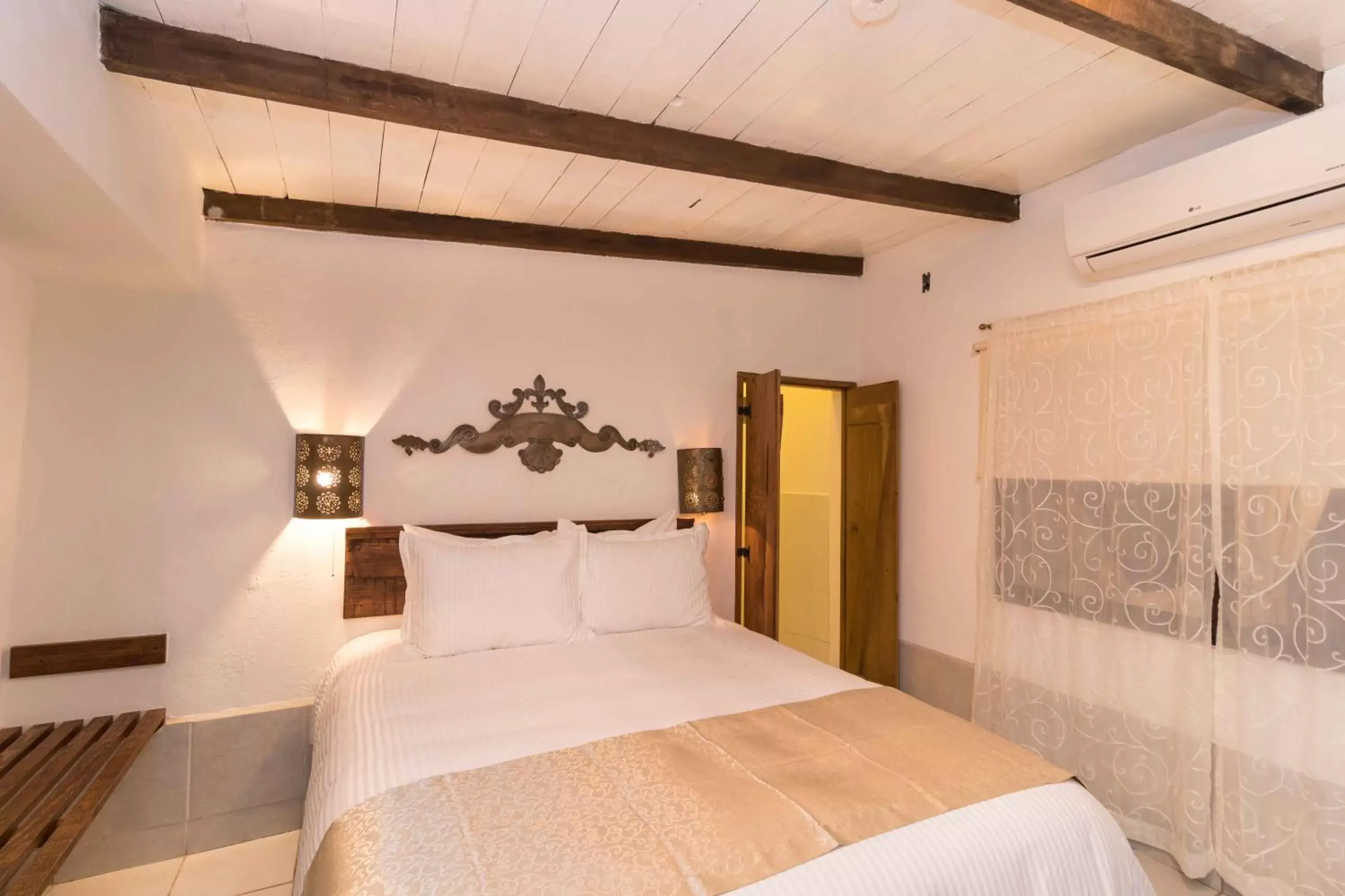 Bed in Hotel 1697 Loreto