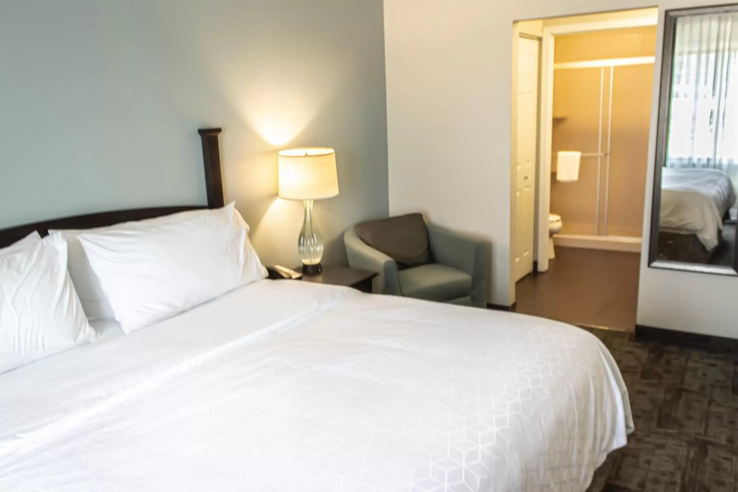 Bed in Staybridge Suites Minot, an IHG Hotel