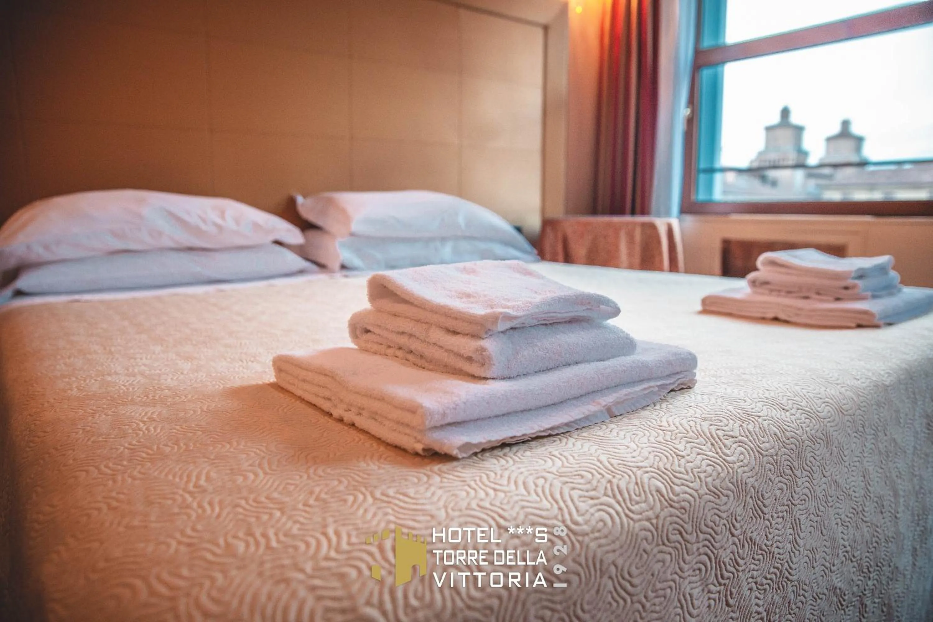 Bed in Panoramic Rooms Torre della Vittoria