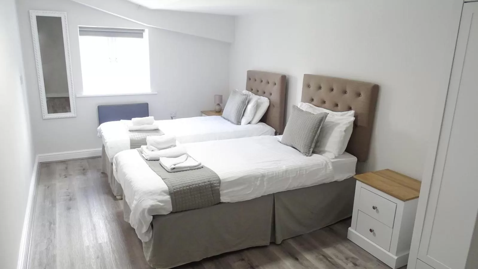 Bed in Cocoon @ International Inn + Apartments