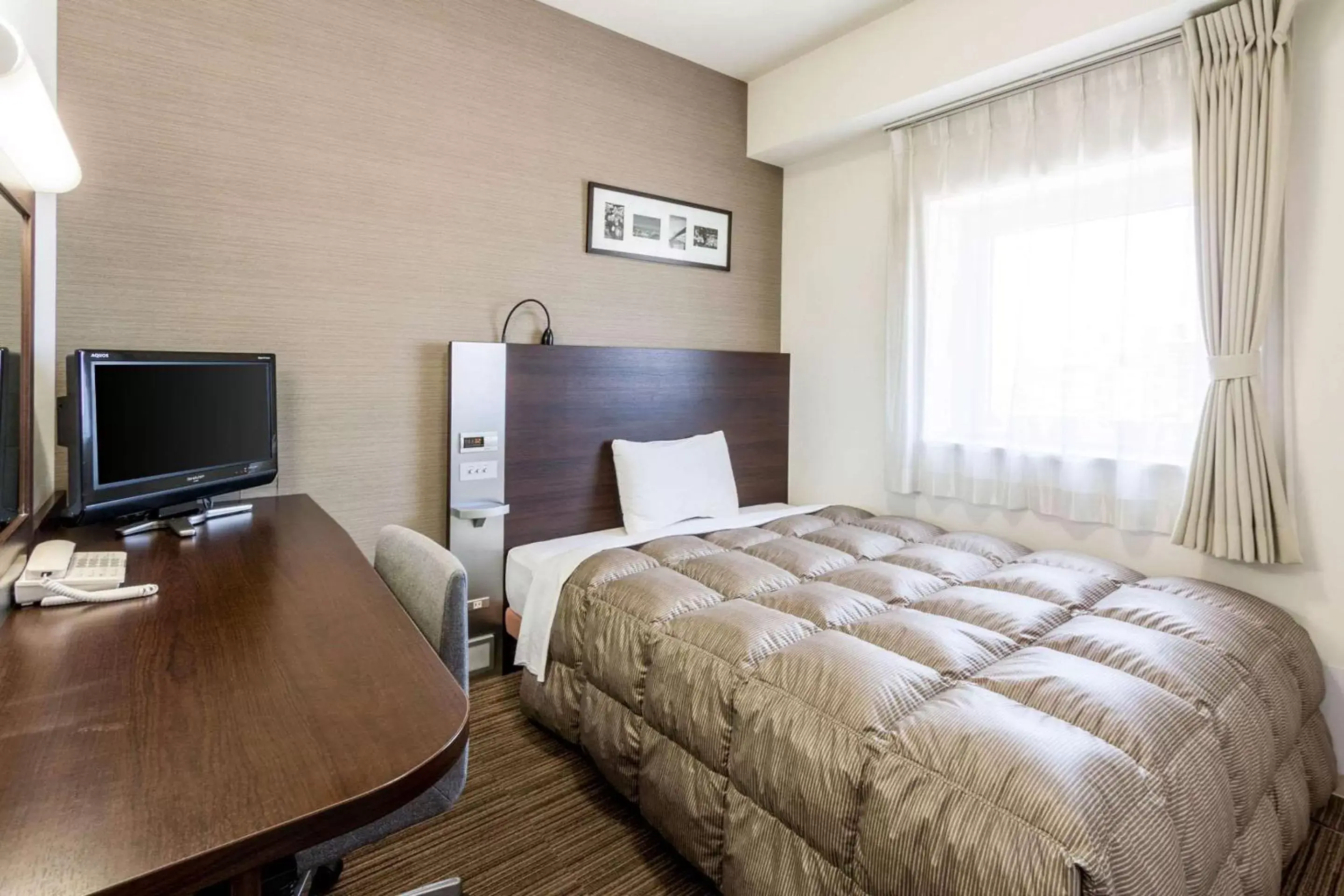 Photo of the whole room, Bed in Comfort Hotel Kurosaki