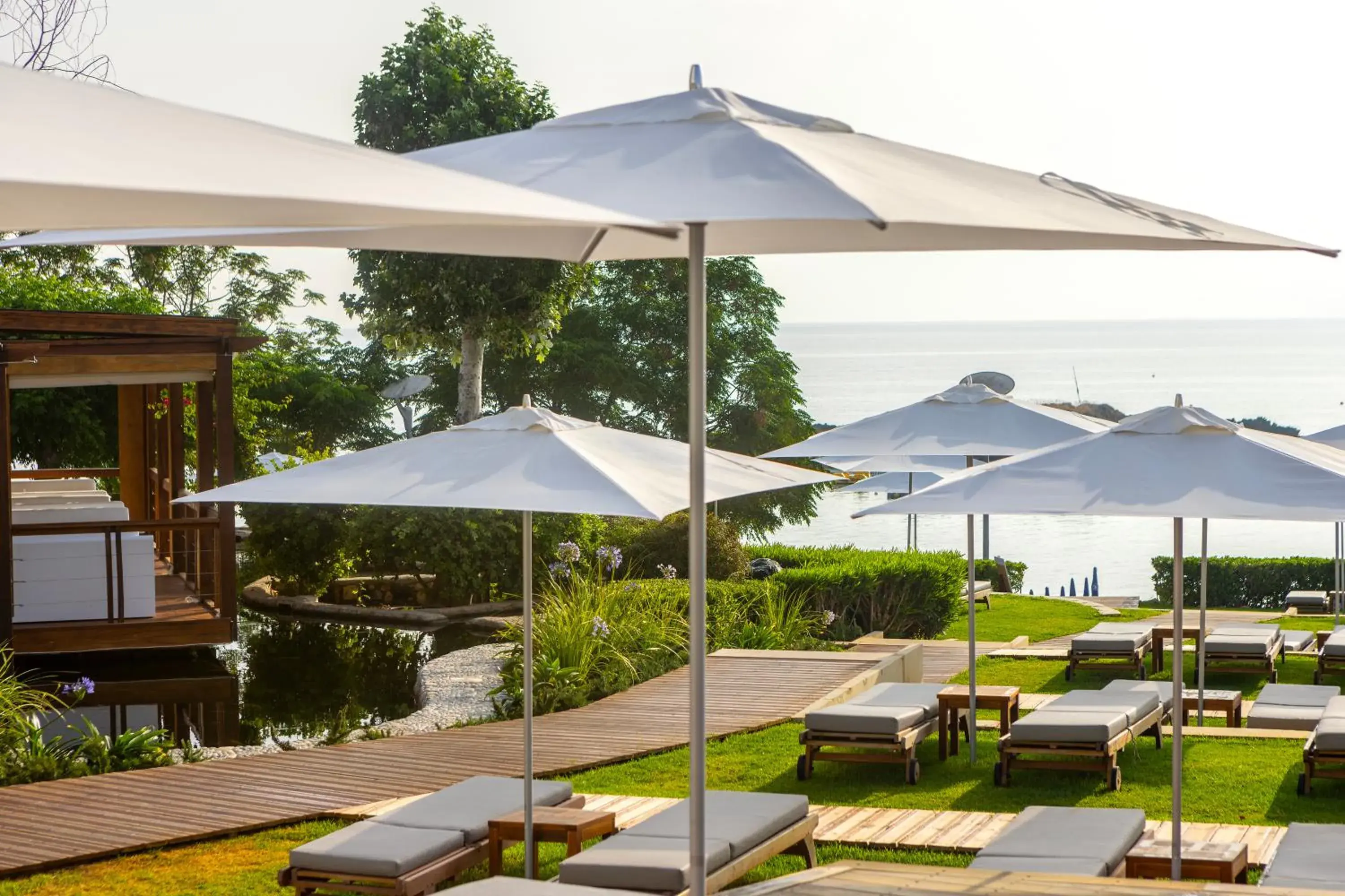 Garden, Swimming Pool in Capo Bay Hotel