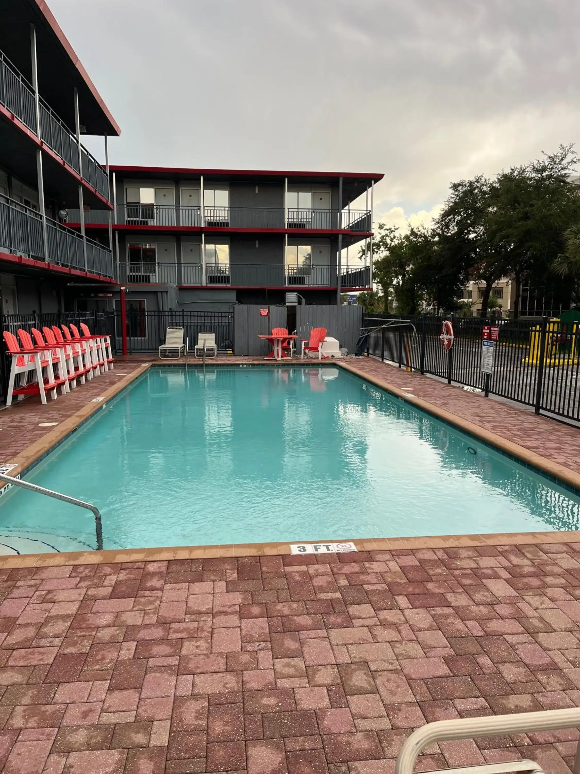 Property building, Swimming Pool in Travelodge by Wyndham Orlando at Heart of International Drive