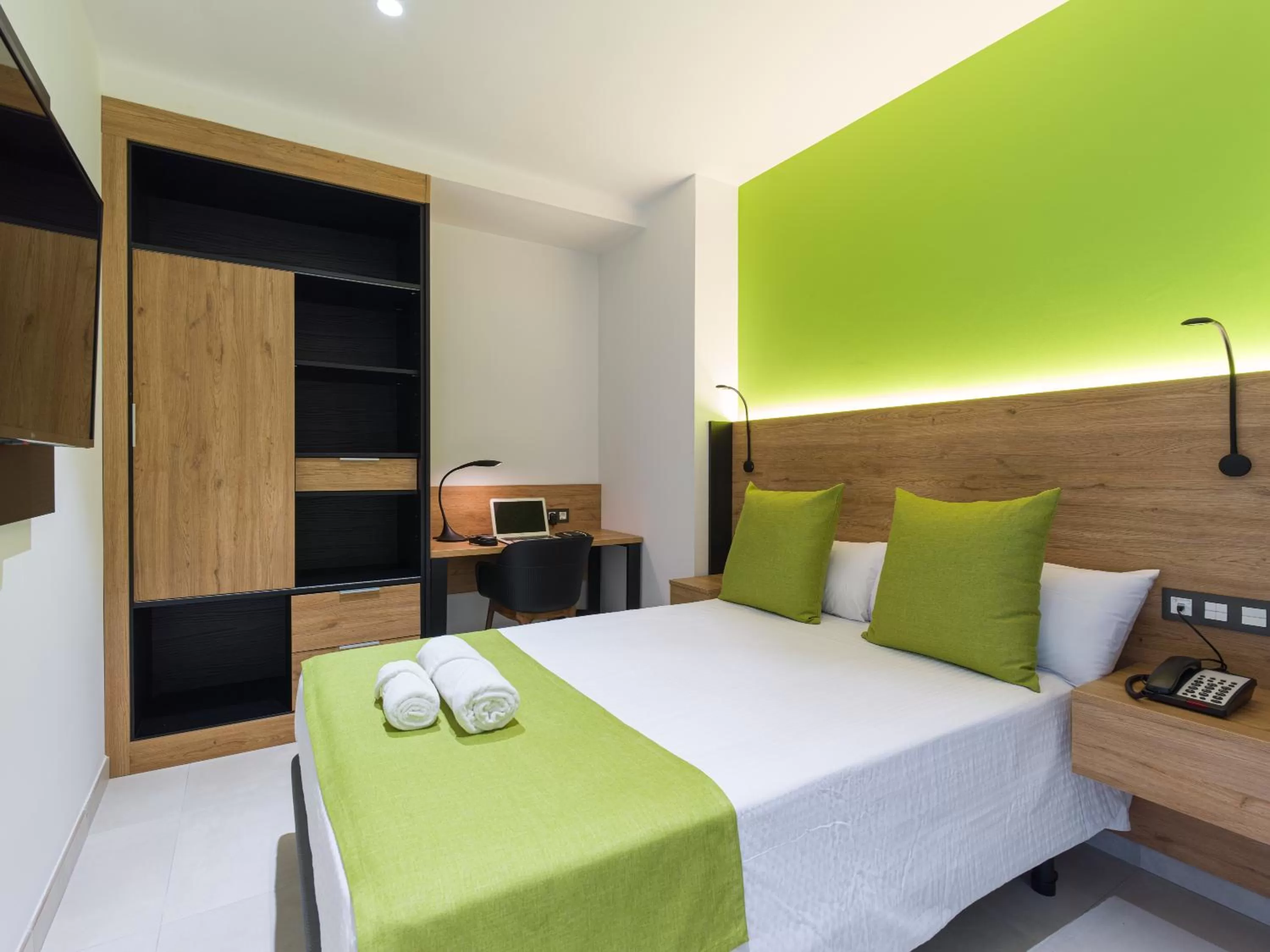 Bed in Hotel MG Poniente