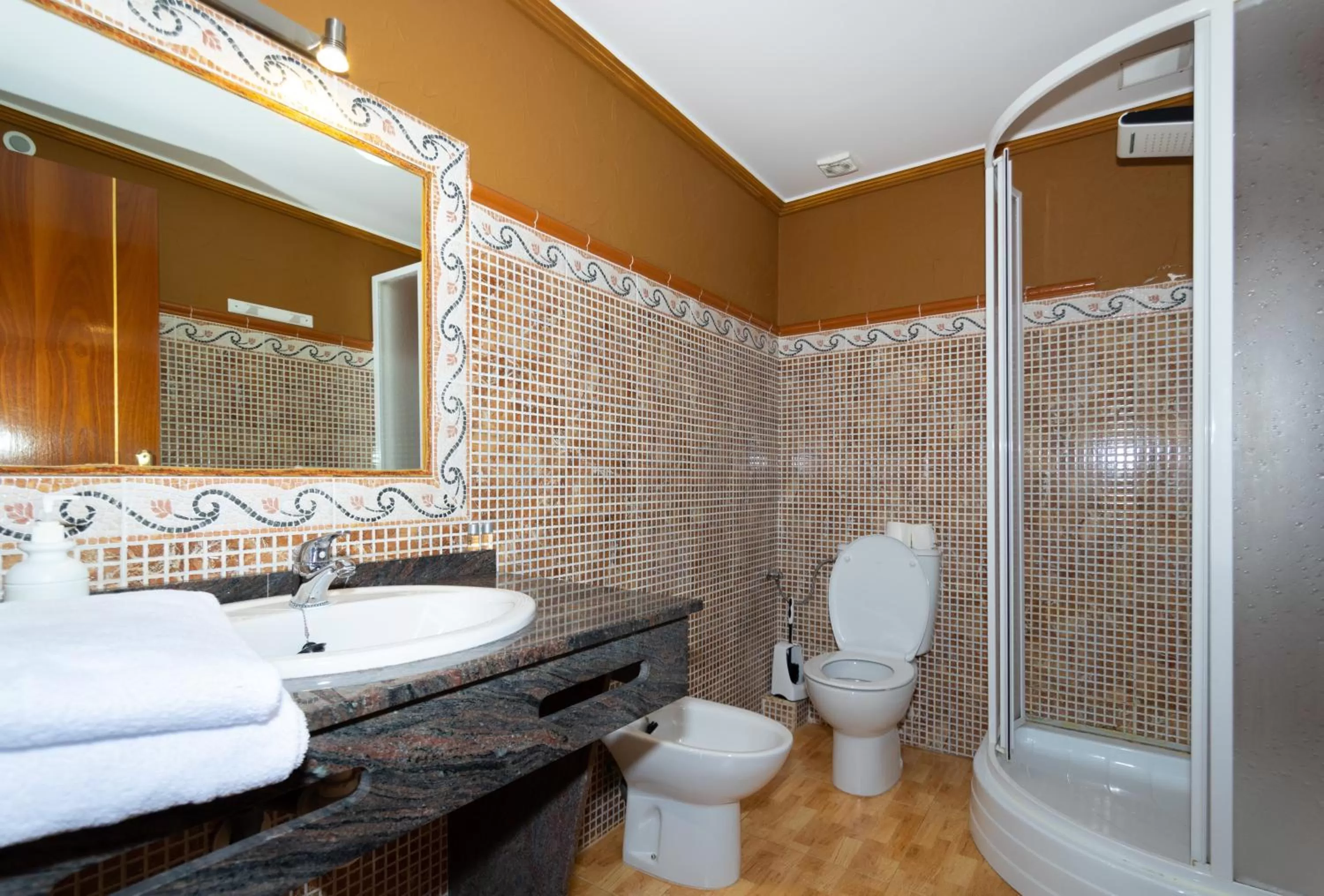 Bathroom in Unique Hotel Apartments
