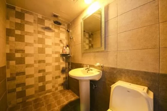 Toilet in Saipan Motel with Sea View