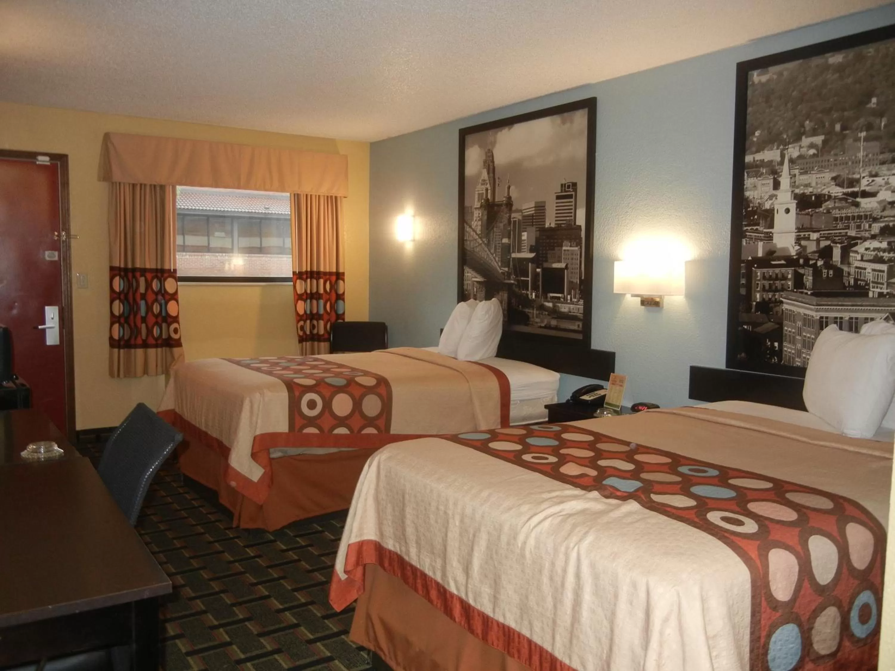 Bed in Super 8 by Wyndham Cincinnati-Springdale OH