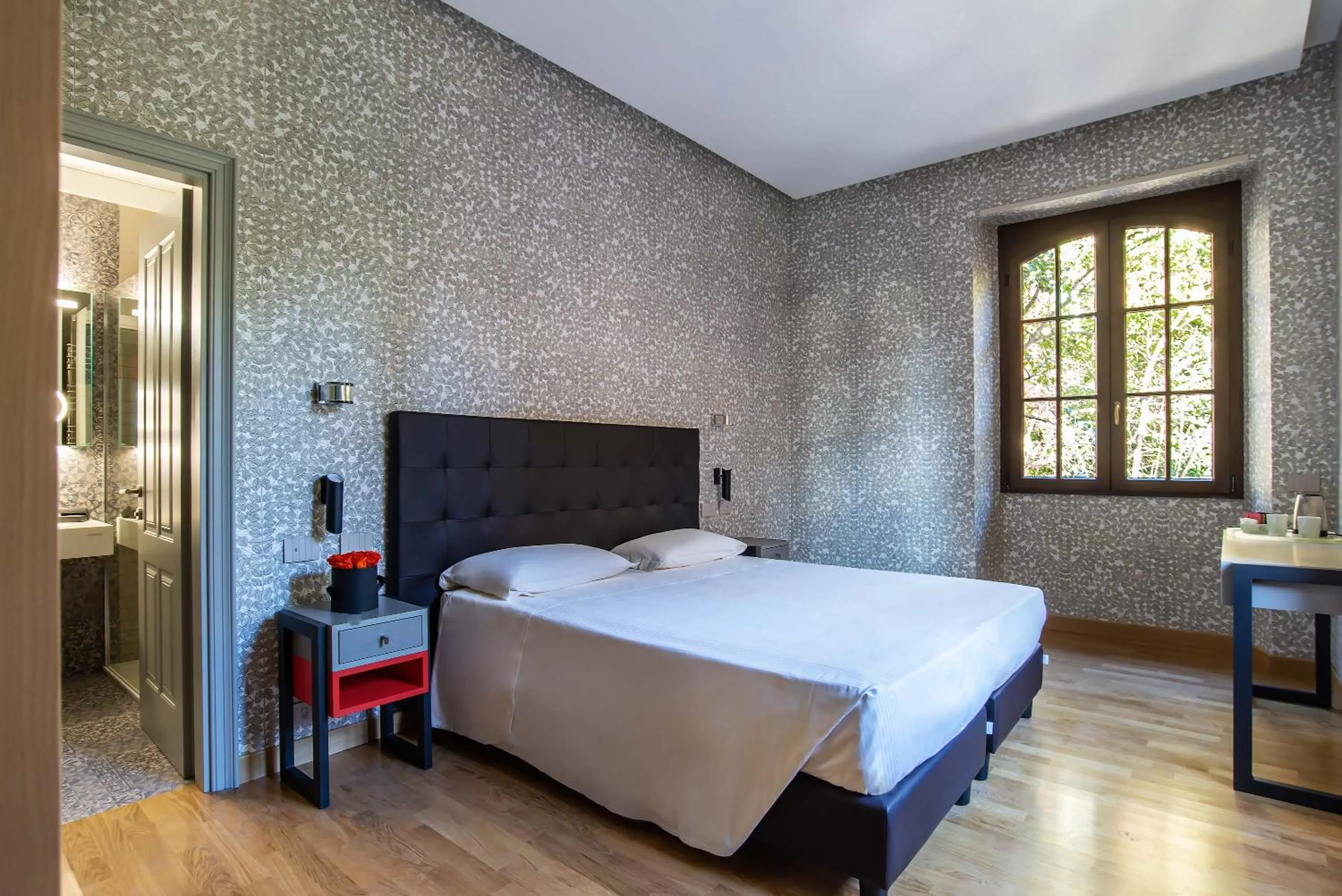 Bed in Albergo Etico Roma