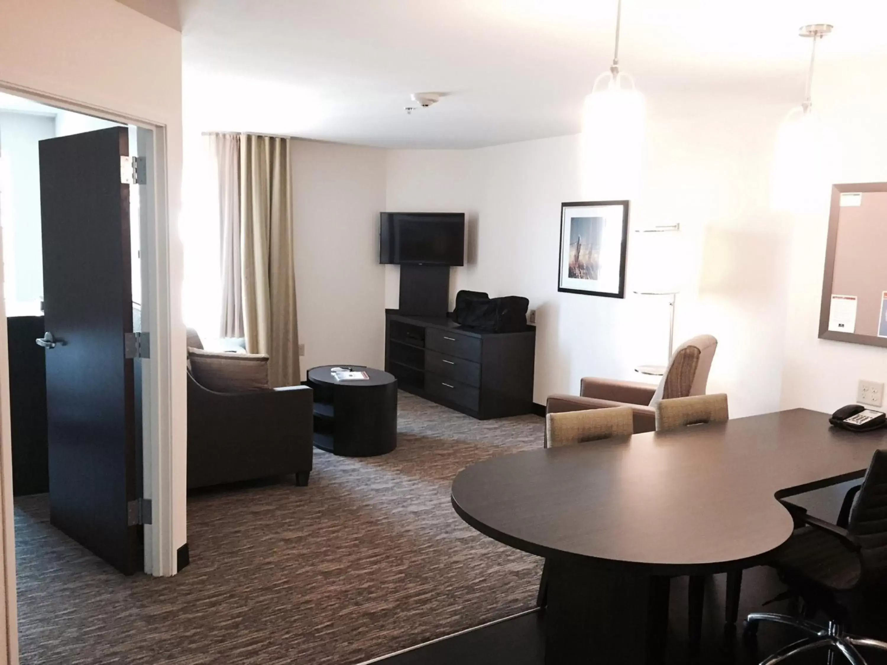 Photo of the whole room, TV/Entertainment Center in Candlewood Suites Youngstown W - I-80 Niles Area, an IHG Hotel