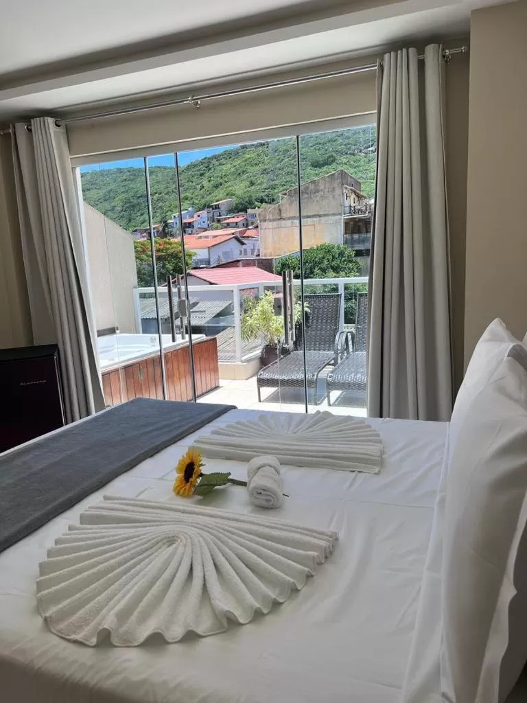 Bed in Pousada Arraial Tropical