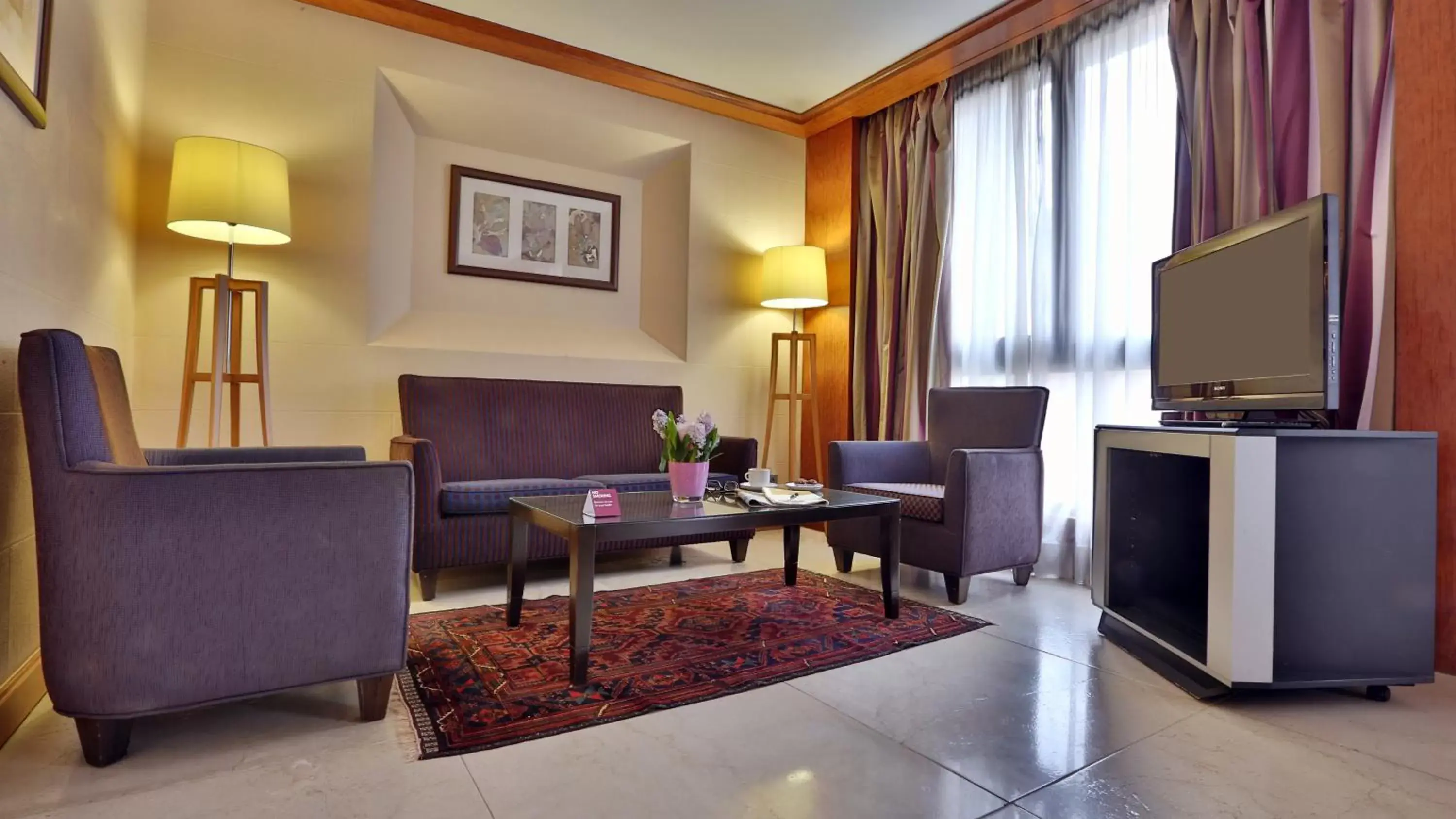 Photo of the whole room, Seating Area in Crowne Plaza Hamra Beirut, an IHG Hotel