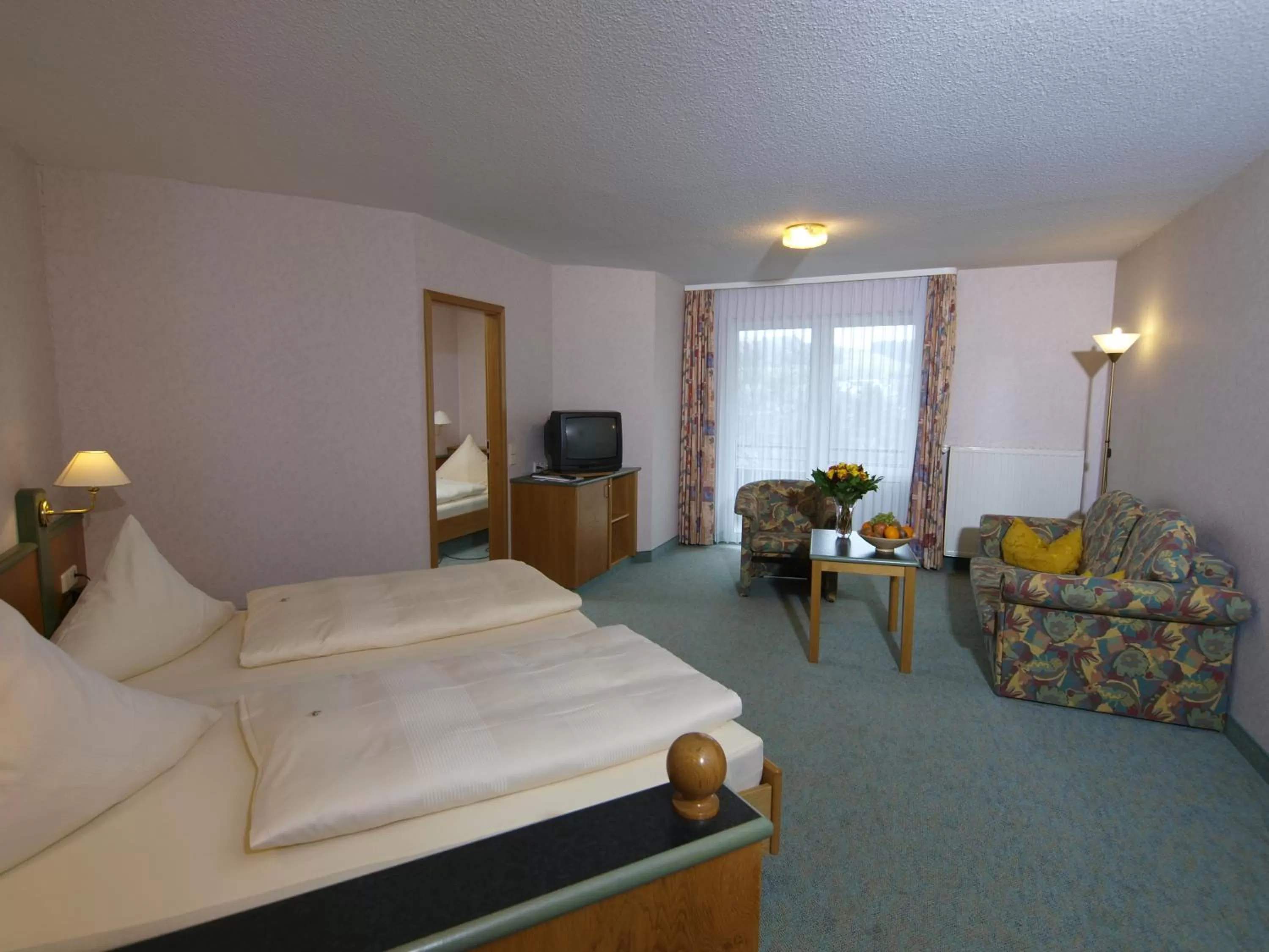 Photo of the whole room, Bed in Landhotel Henkenhof Willingen