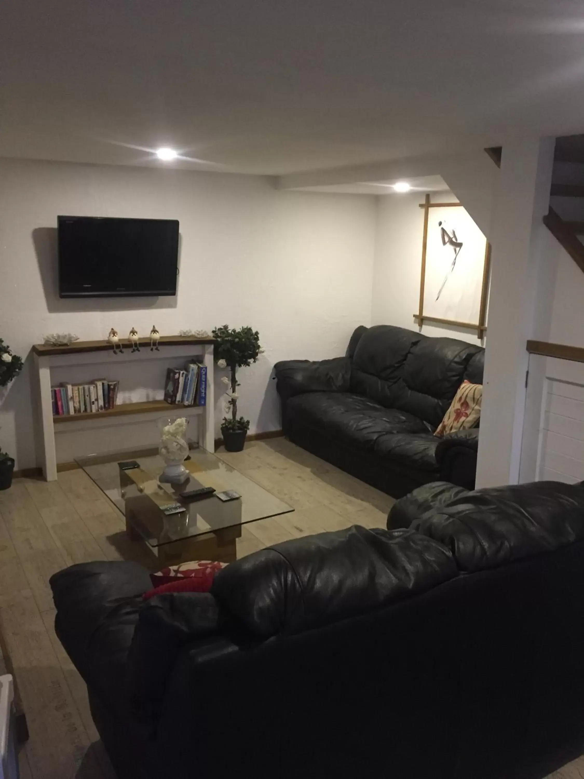 Communal lounge/ TV room, Seating Area in Barton Gate Farm B&B