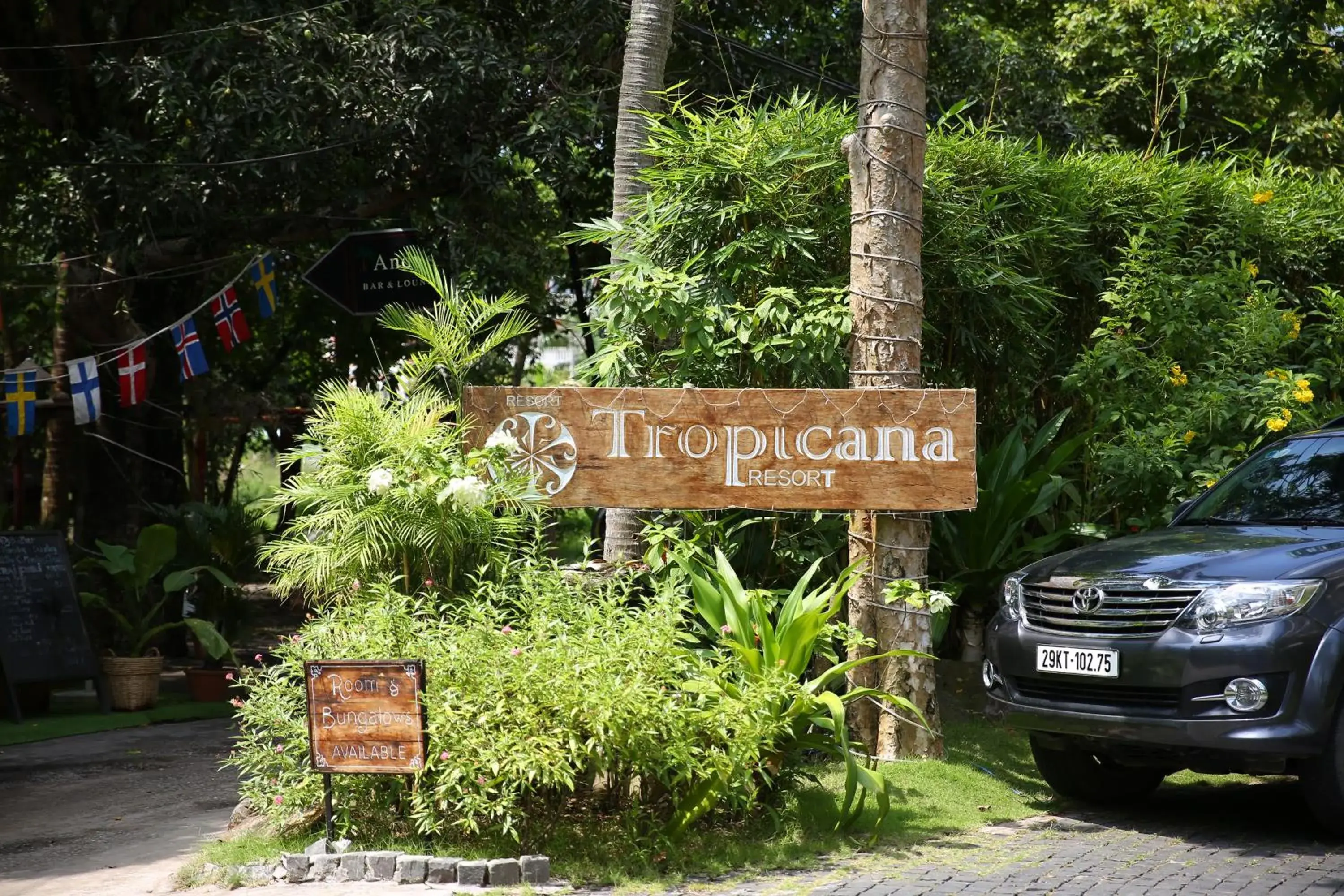 Property logo or sign in Tropicana Resort Phu Quoc