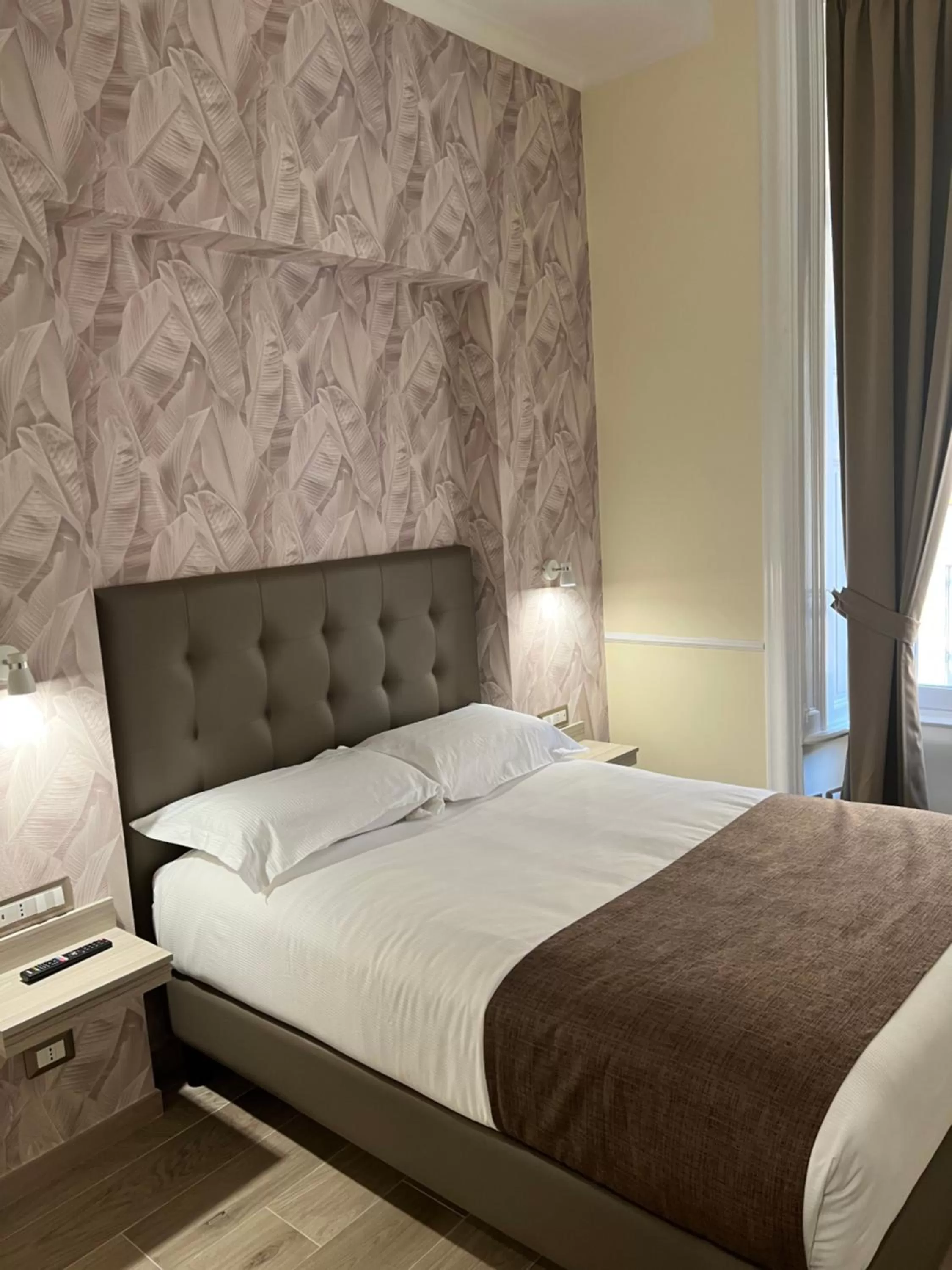 Bed in Hotel Le Petit