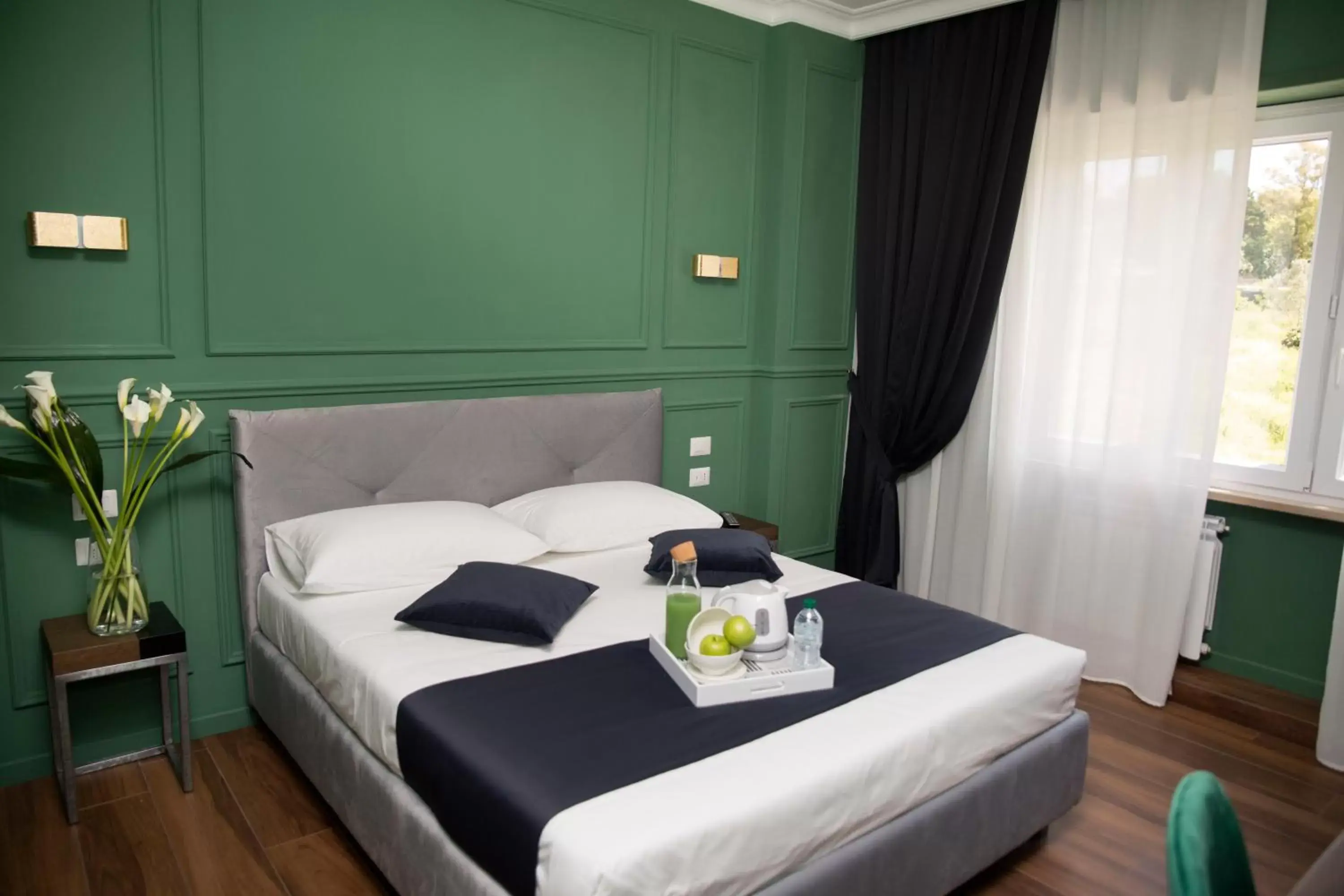 Bed in Unicum Roma Suites