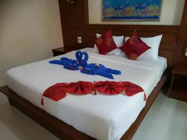 Bed in Tamarind Twin Resort