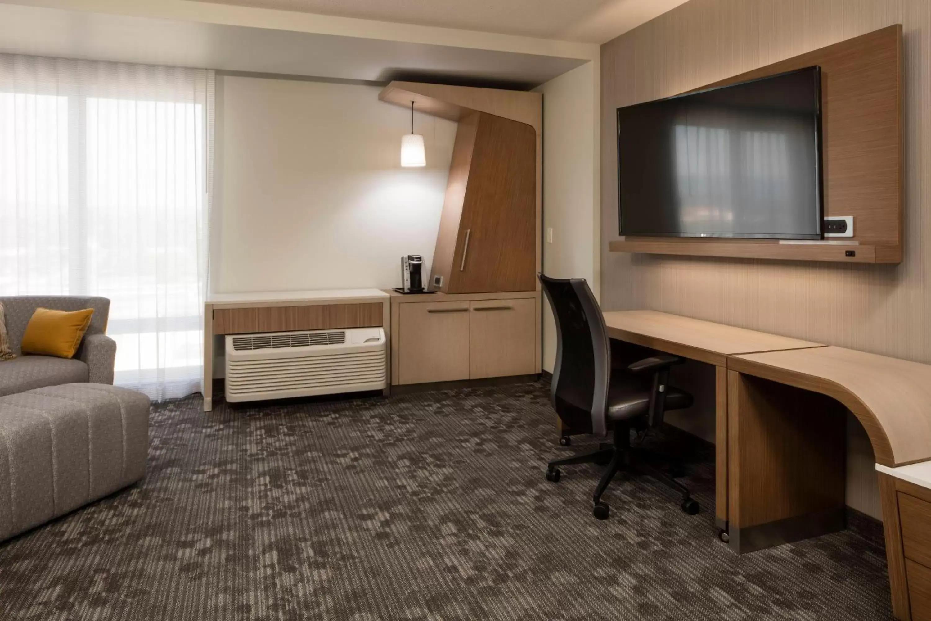 Photo of the whole room, TV/Entertainment Center in Courtyard by Marriott Prince George