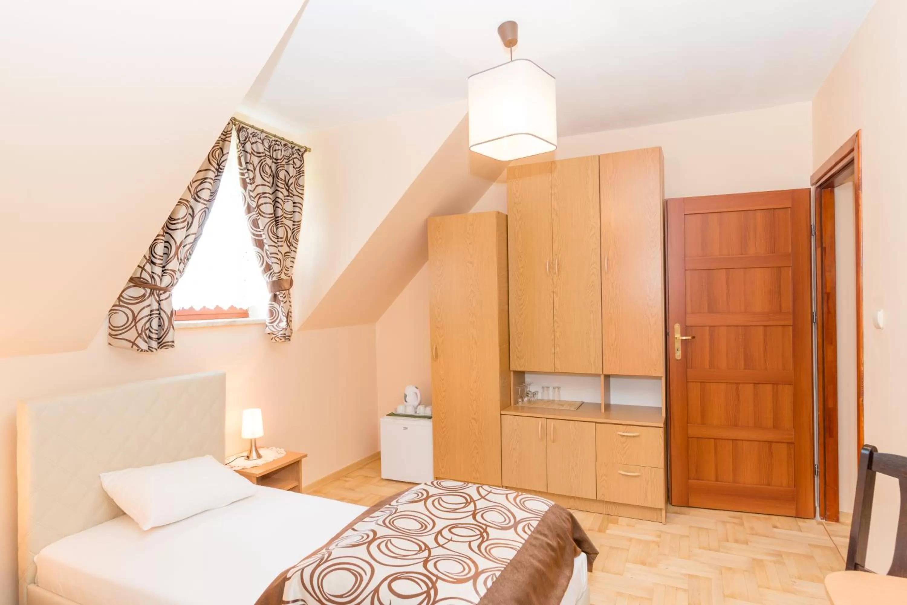 Bed in Gościniec Pięciu Stawów