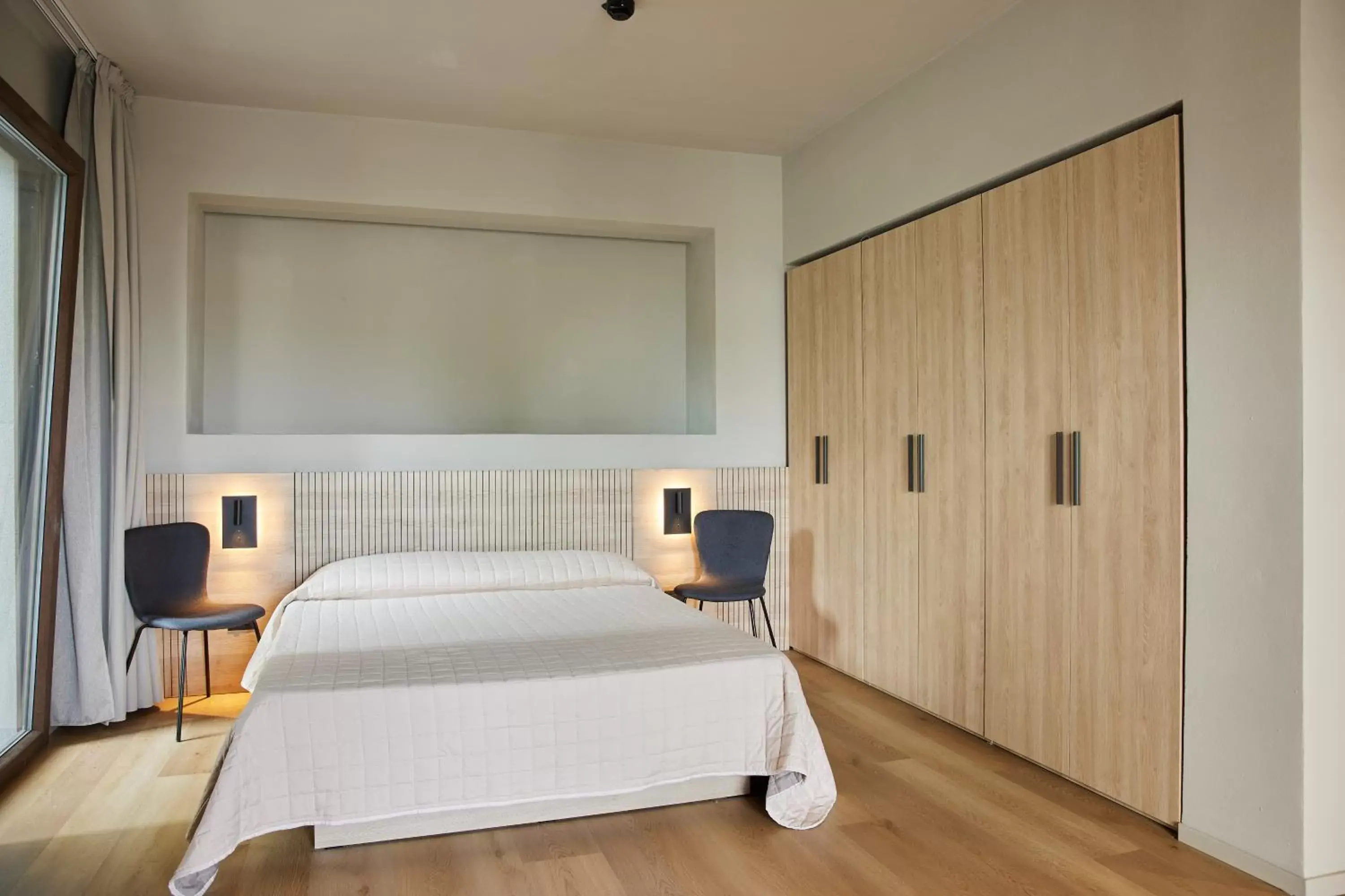 Bed in Mima Aparthotel Boutique & Spa