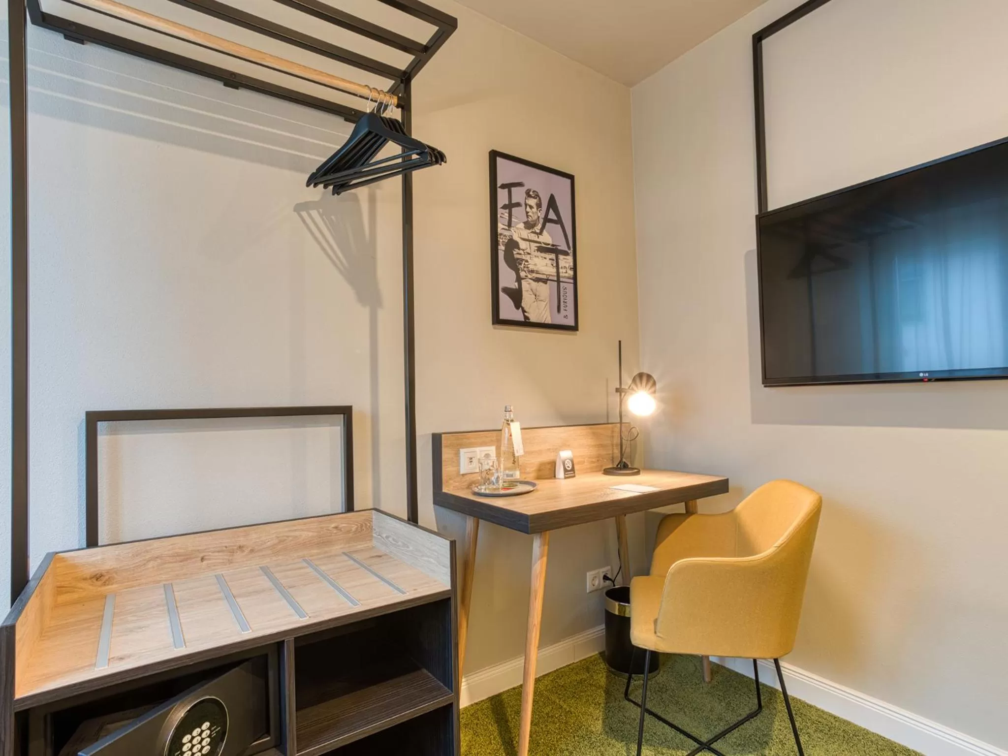 Photo of the whole room, TV/Entertainment Center in NYCE Hotel Ingolstadt