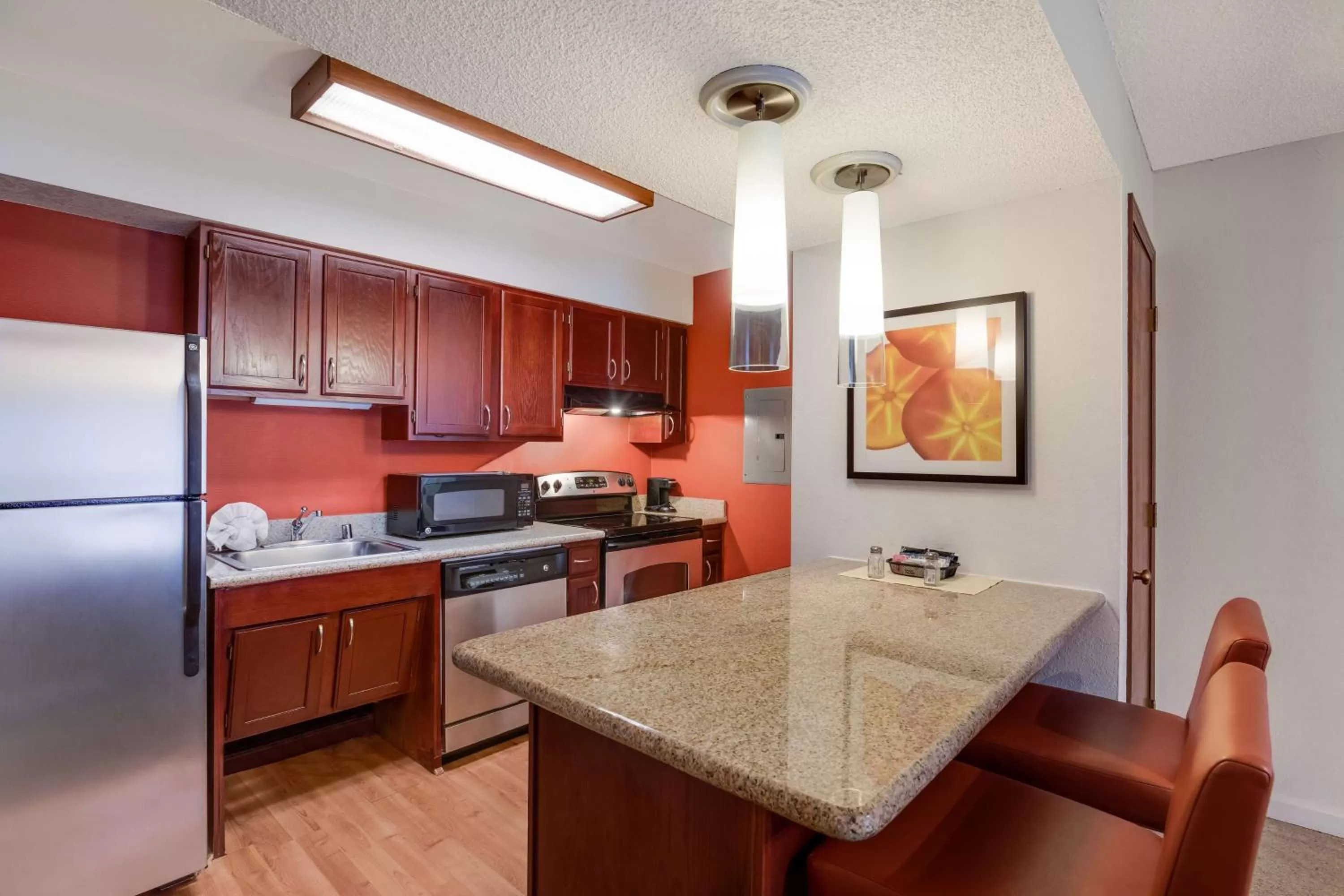 Bedroom in SenS Suites Livermore; SureStay Collection by Best Western