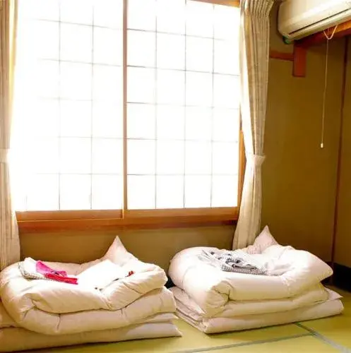 Bed in Daiya Ryokan