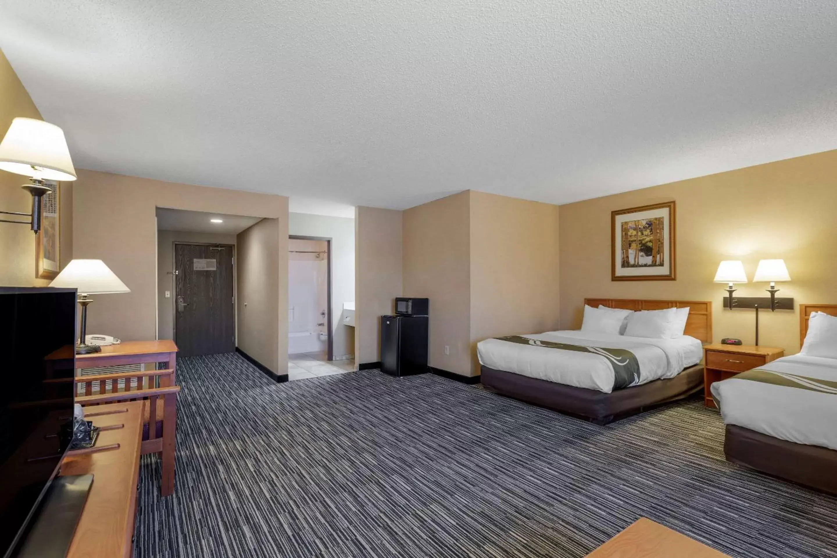 Bedroom in Quality Inn & Suites Wellington – Fort Collins
