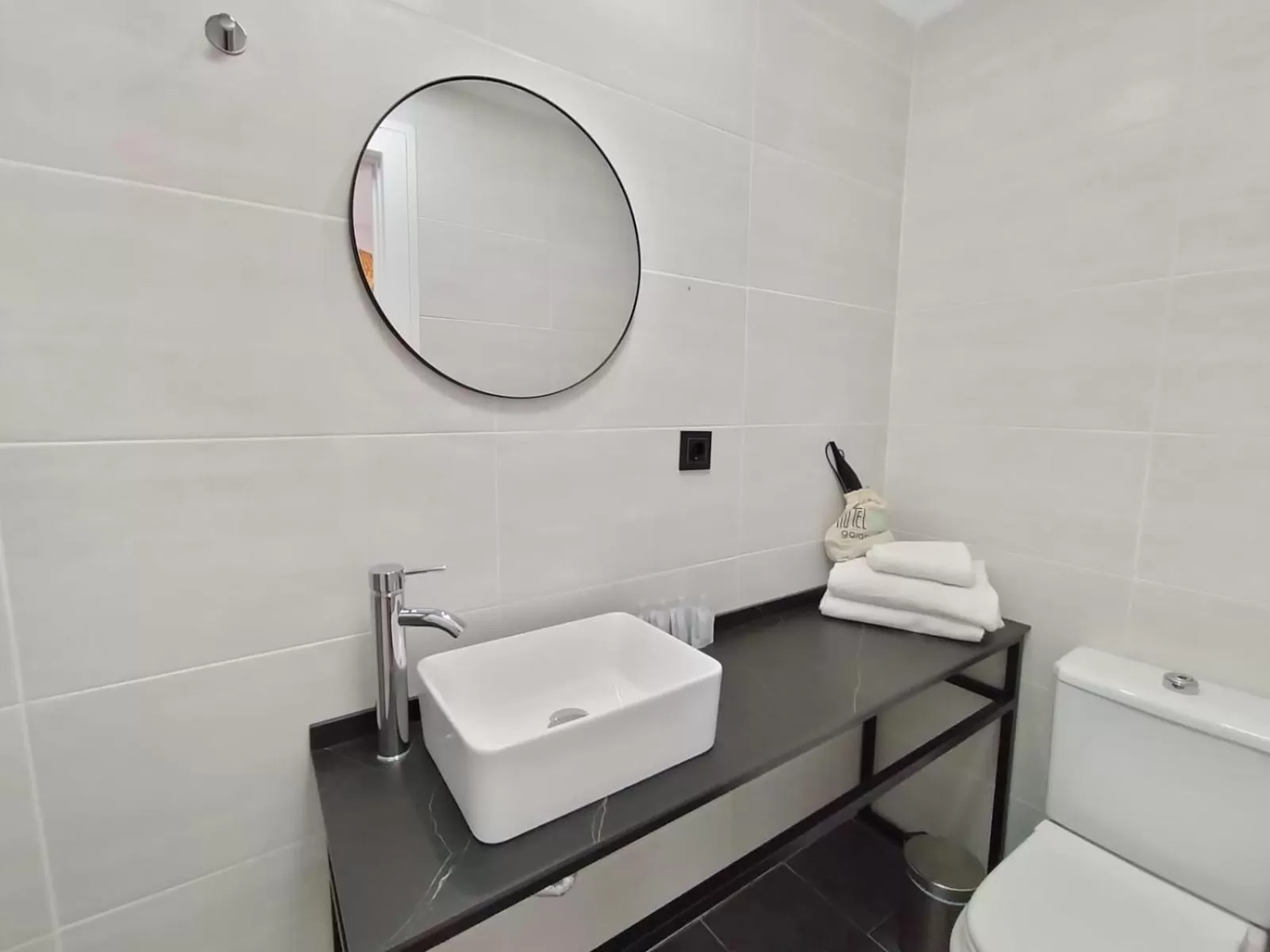 Bathroom in Hotel Matilde by gaiarooms