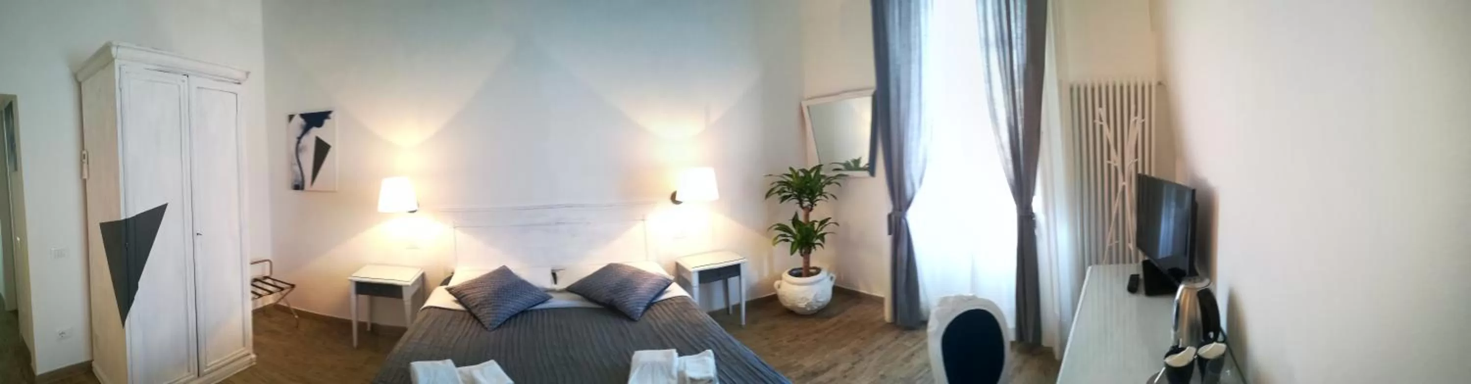 Bed, Seating Area in In San Frediano B&B