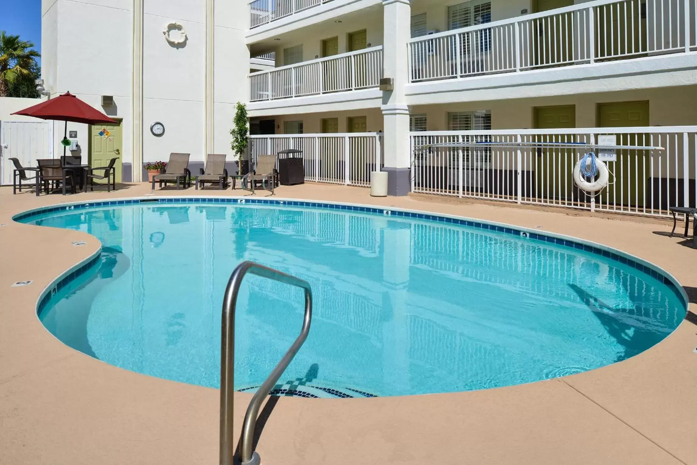 Swimming Pool in SureStay Plus Hotel by Best Western Tempe University