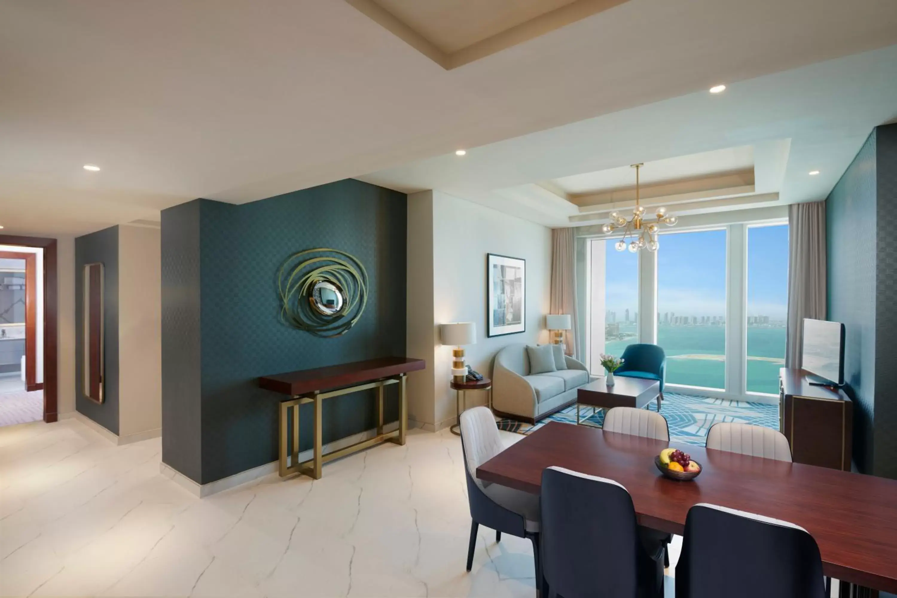 Living room, Dining Area in Wyndham Grand Doha West Bay Beach