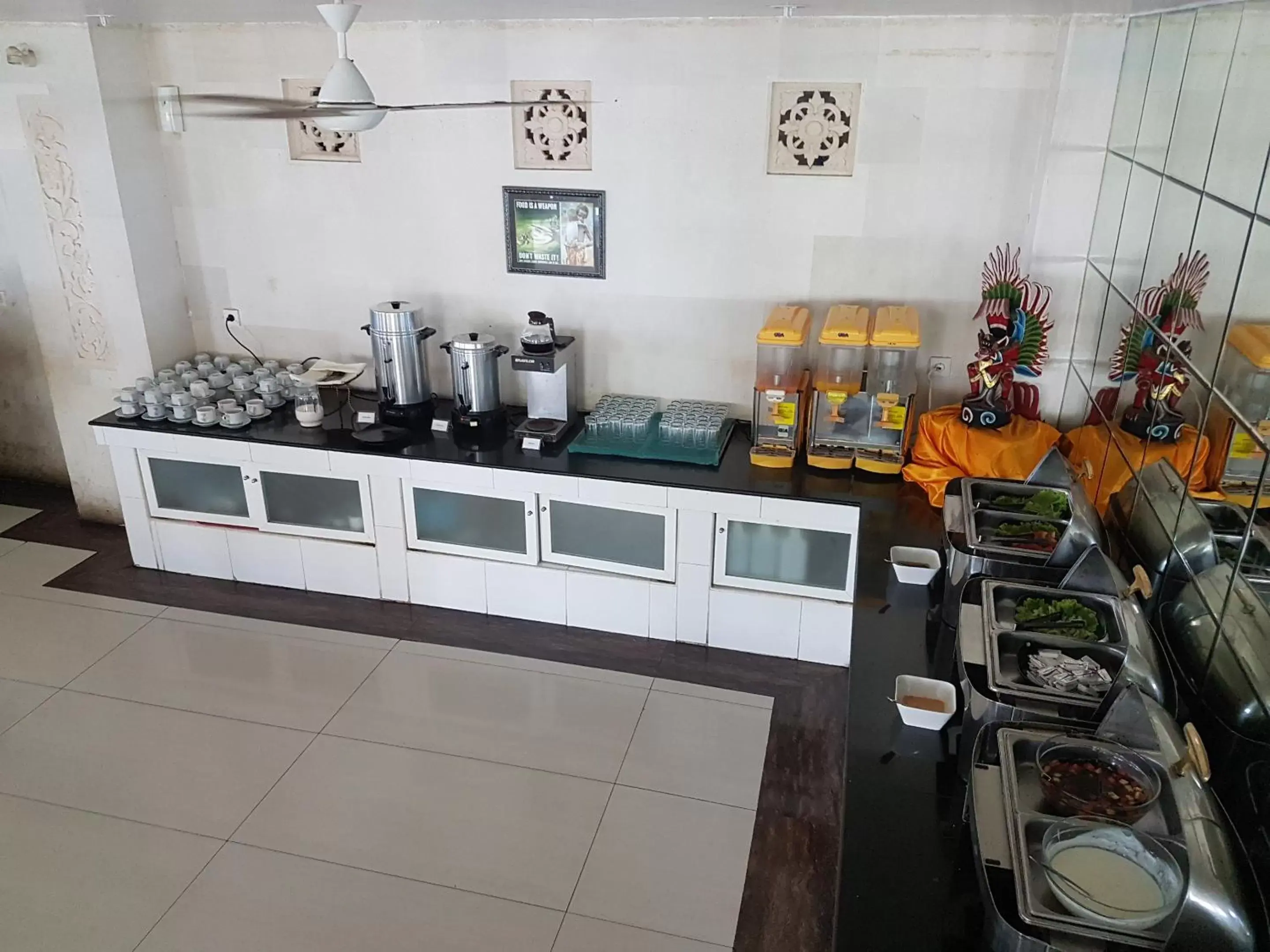 Breakfast, Kitchen/Kitchenette in Melasti Beach Resort & Spa Legian