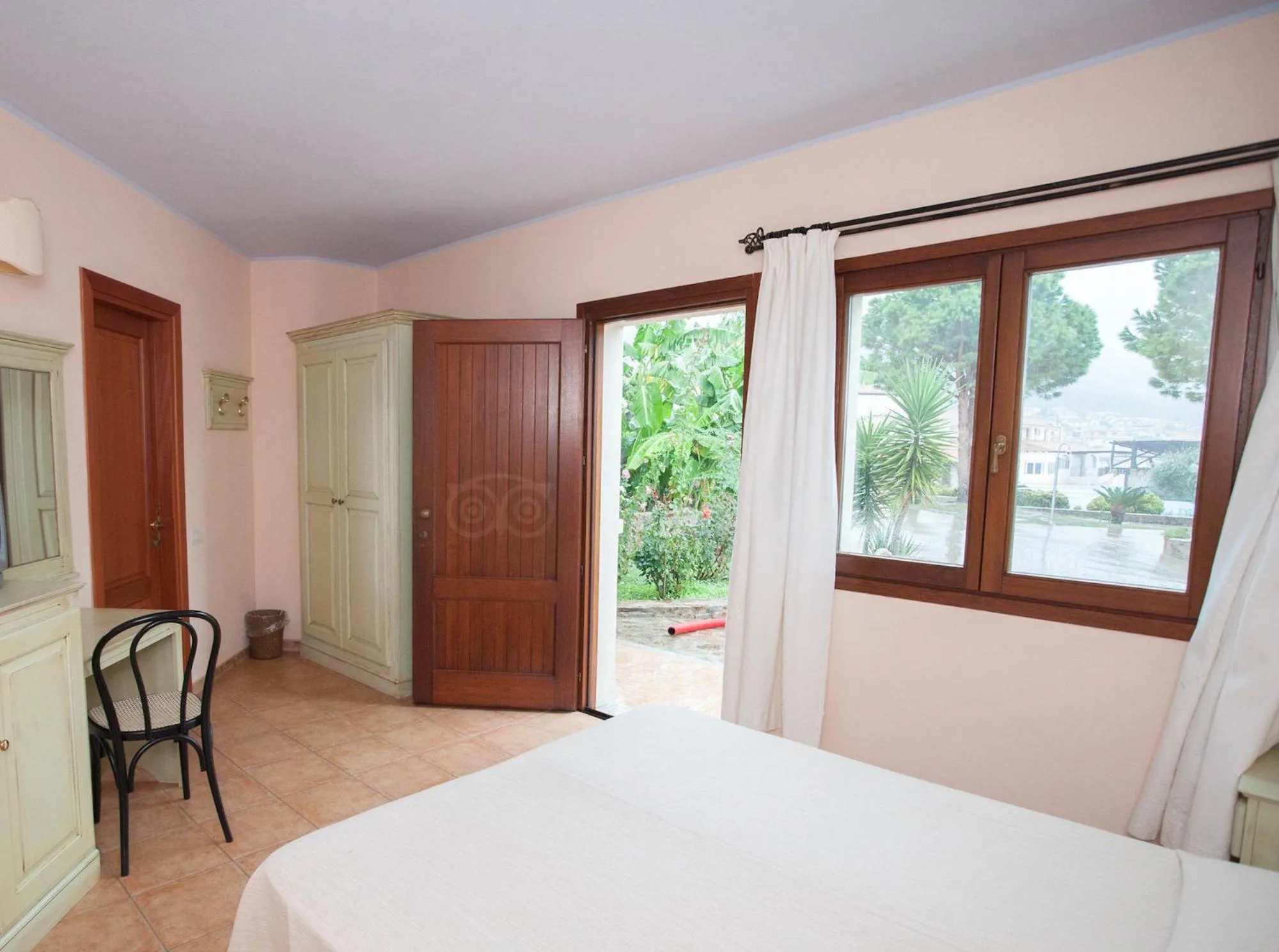 Photo of the whole room, Bed in Club Esse Cala Gonone