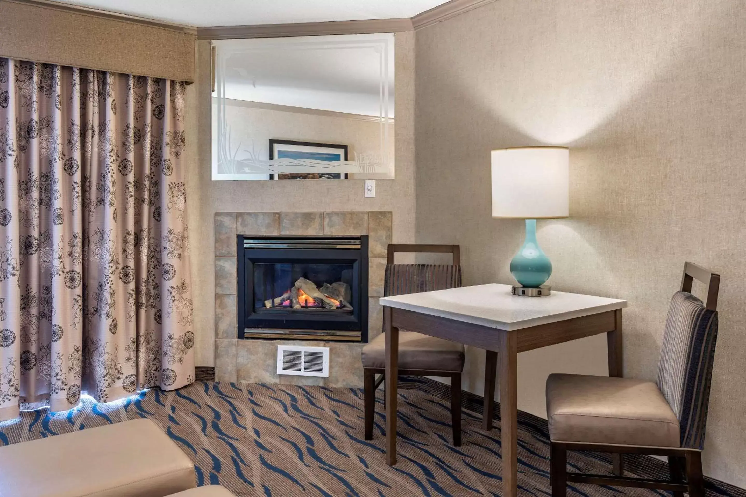 Photo of the whole room, Seating Area in Elizabeth Oceanfront Suites, Ascend Hotel Collection