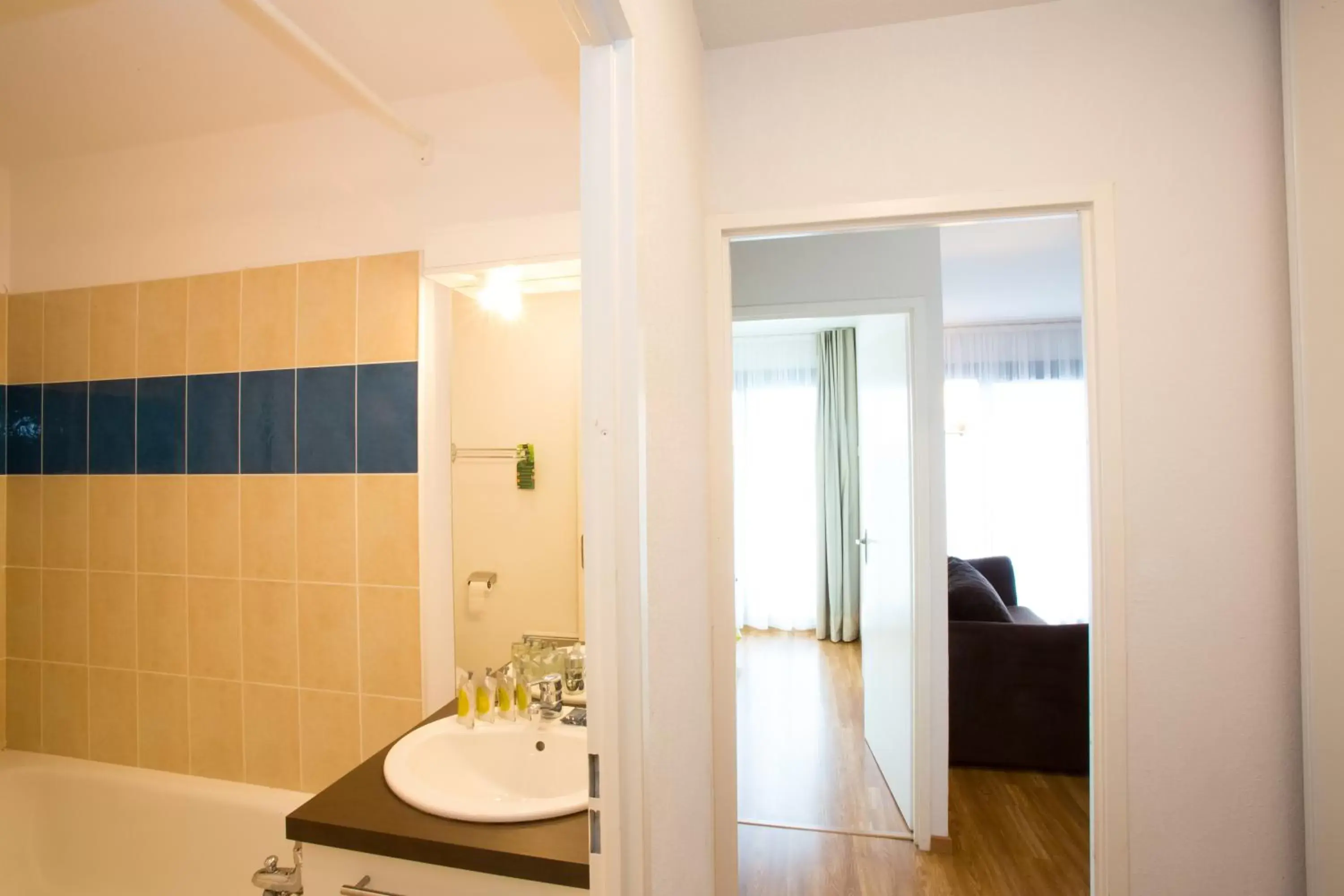 Bathroom in All Suites La Teste – Bassin d’Arcachon