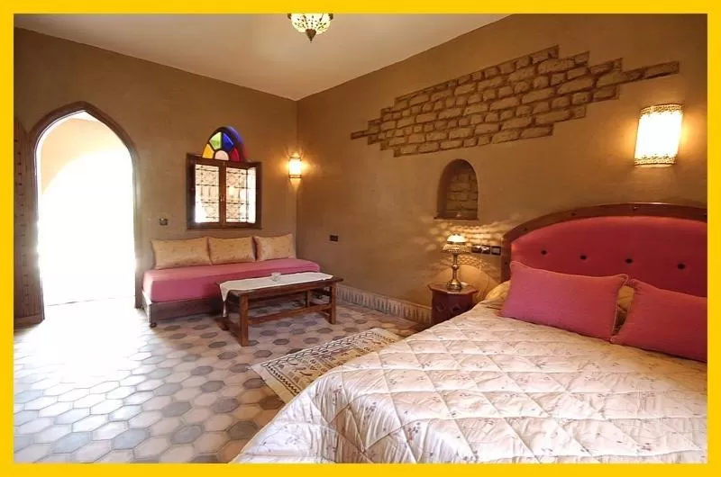 Photo of the whole room, Bed in La Rose Du Desert