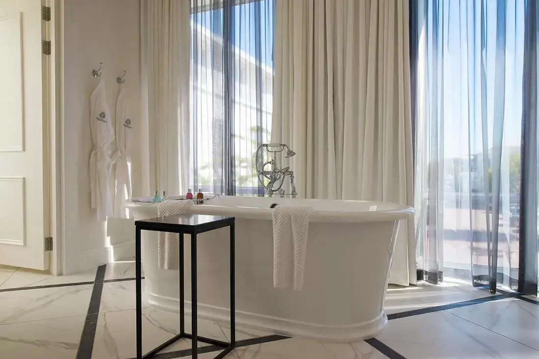 Bathroom in The Manor House at the Queen Victoria Hotel by NEWMARK