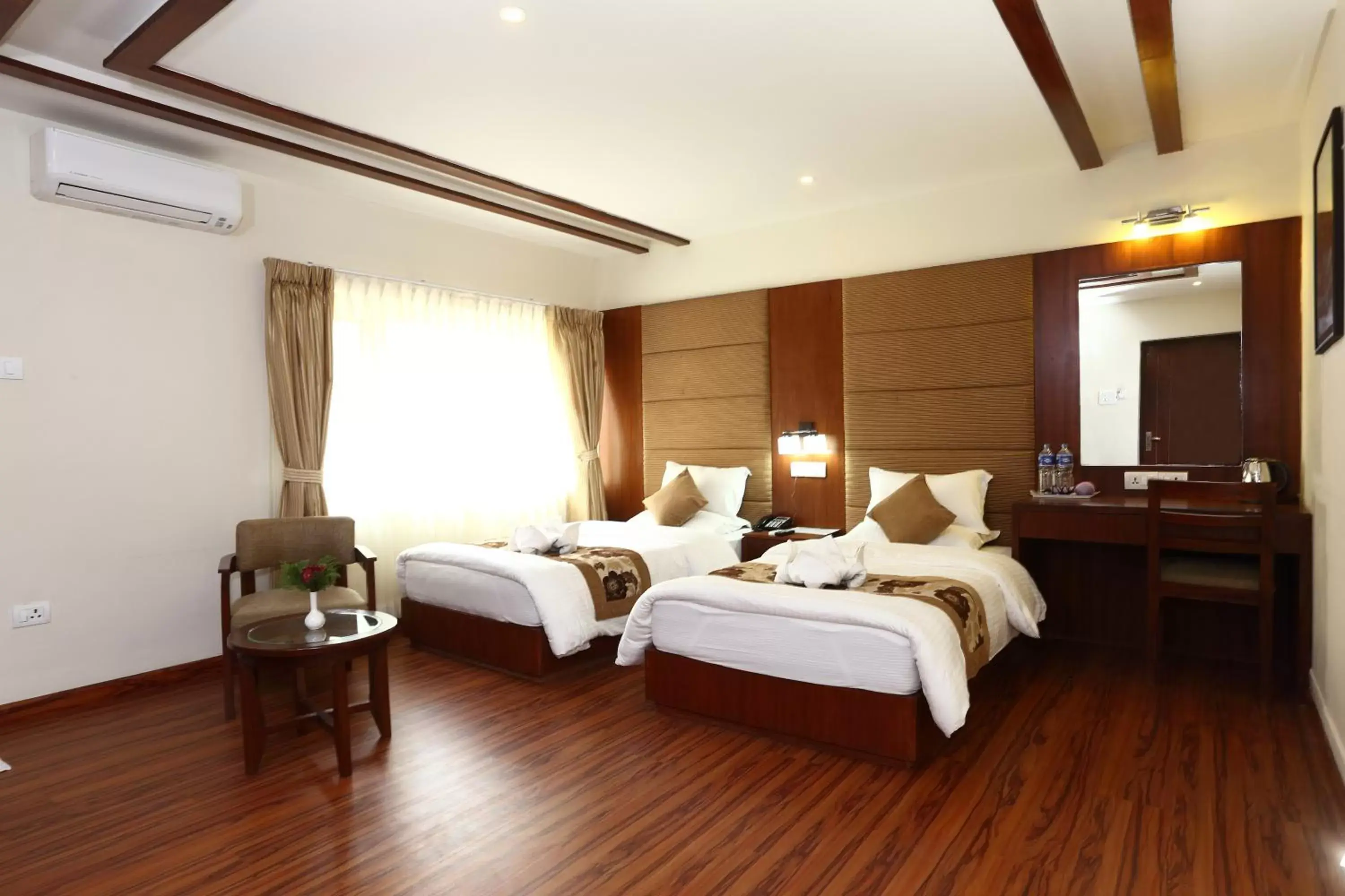 Bed in Aryatara Kathmandu Hotel