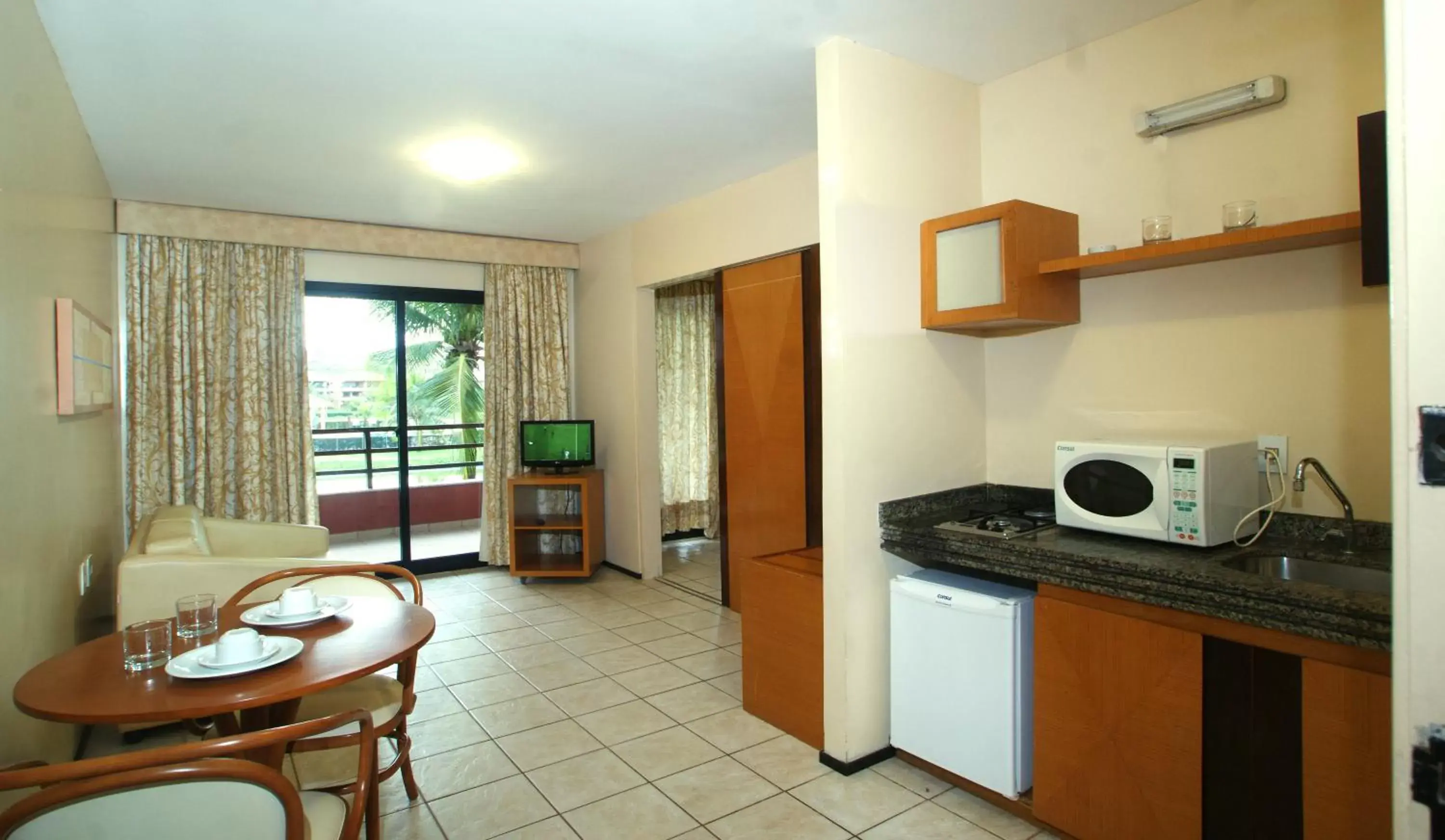 Photo of the whole room, Kitchen/Kitchenette in Aquaville Resort