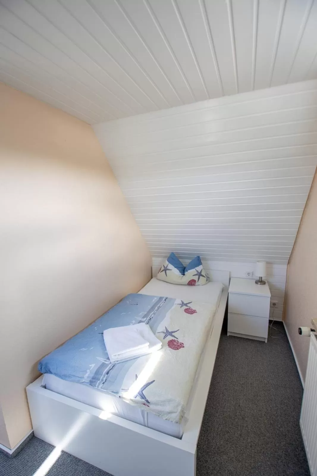 Photo of the whole room, Bed in Hotel Pension Nordseewelle