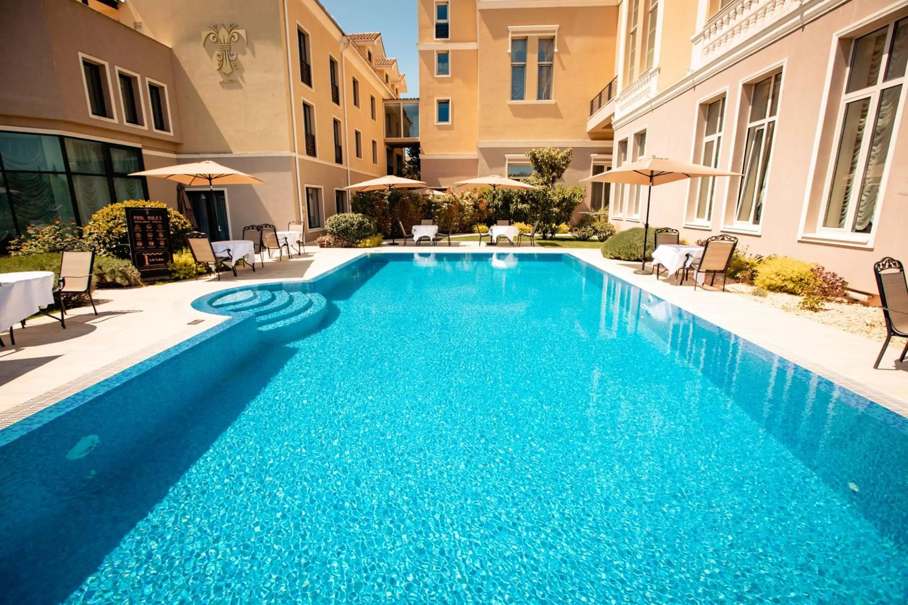 Swimming pool in Tresor Le Palais Timisoara, Curio Collection by Hilton Swimming pool in Tresor Le Palais Timisoara, Curio Collection by Hilton