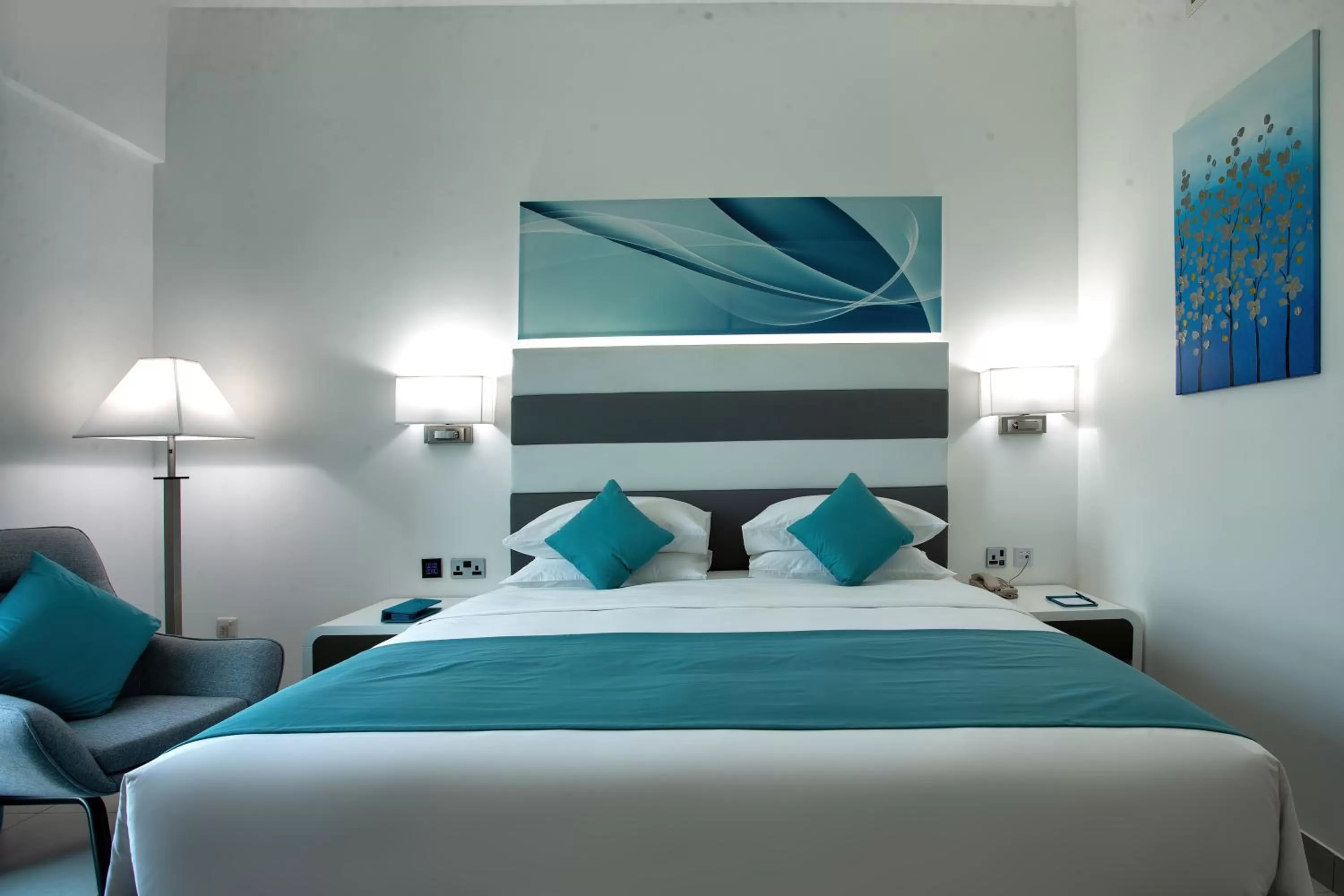 Bed in City Avenue Al Reqqa Hotel