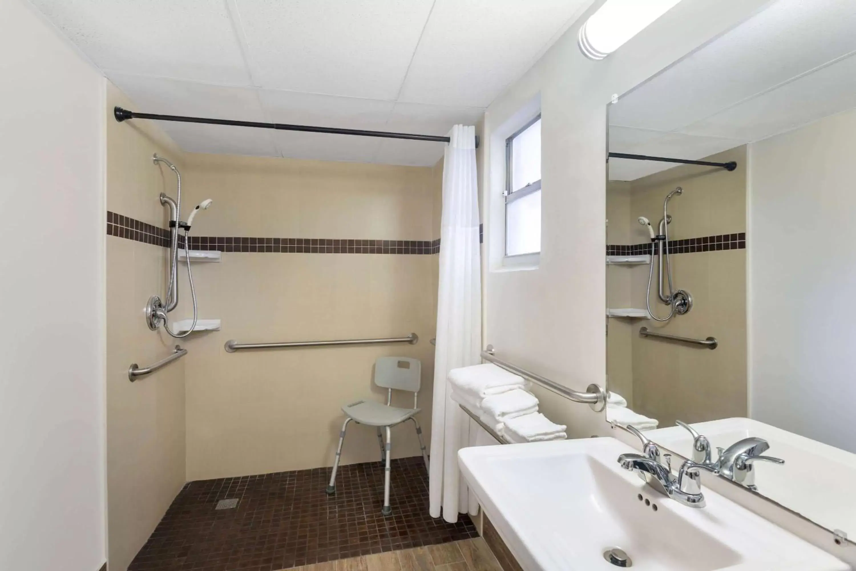 Shower, Bathroom in Super 8 by Wyndham Bradenton Sarasota Area